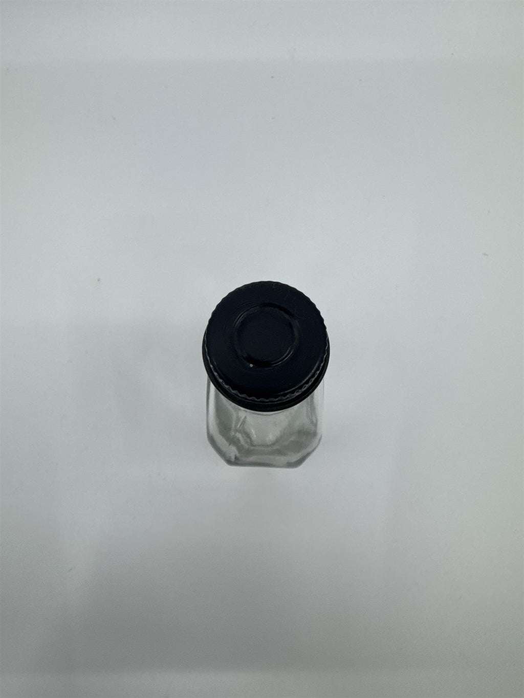 Vintage Sloan's Liniment Embossed Glass Bottle with Black Twist Cap