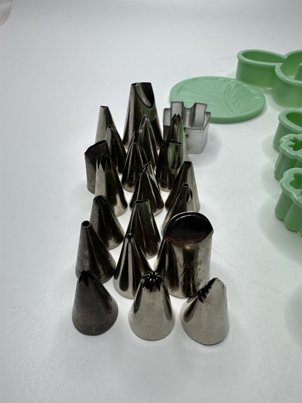 Lot of 46 Milton Small Piping Tips and Small Cookie Cutters Mint Green Color