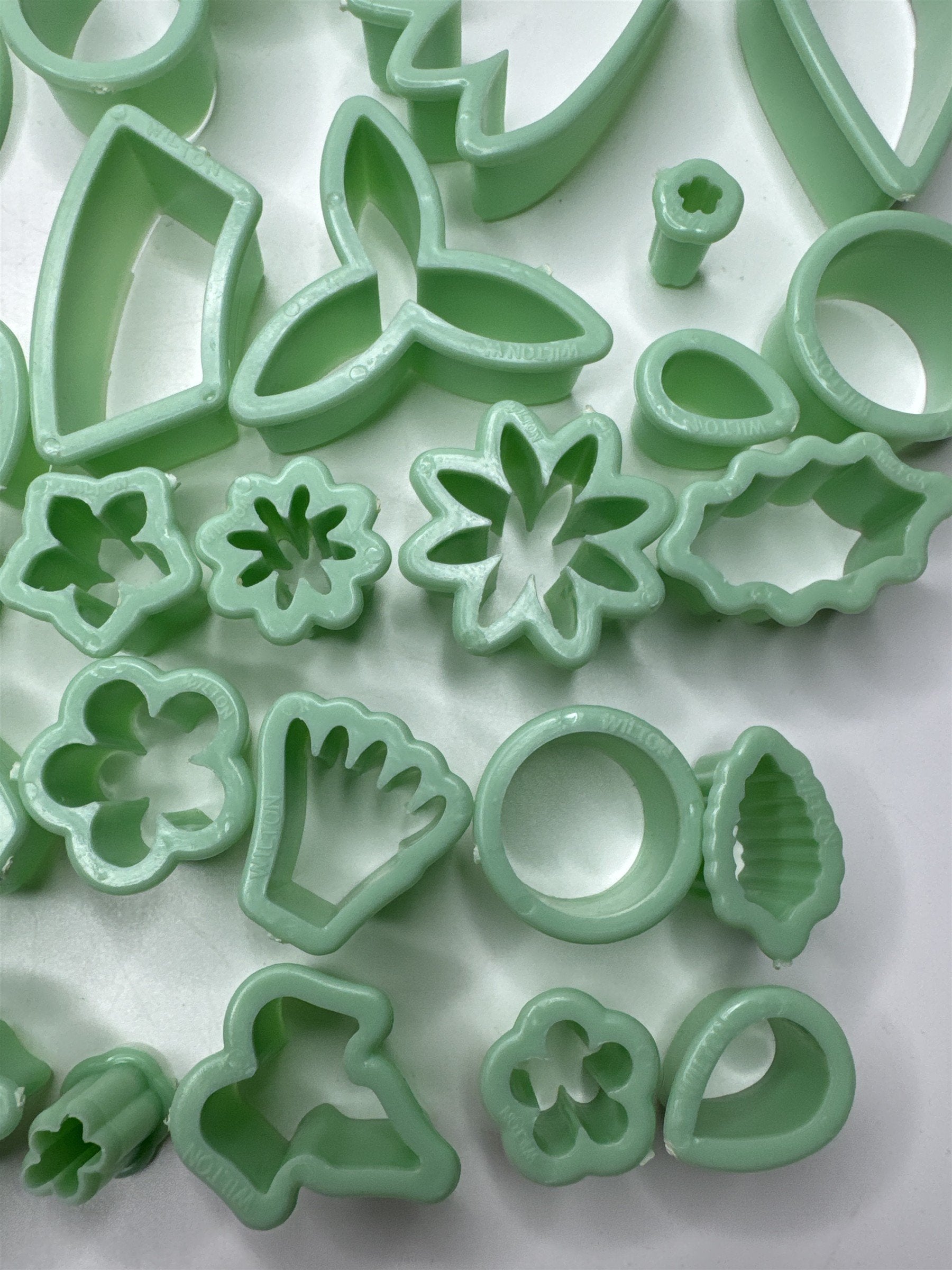 Lot of 46 Milton Small Piping Tips and Small Cookie Cutters Mint Green Color