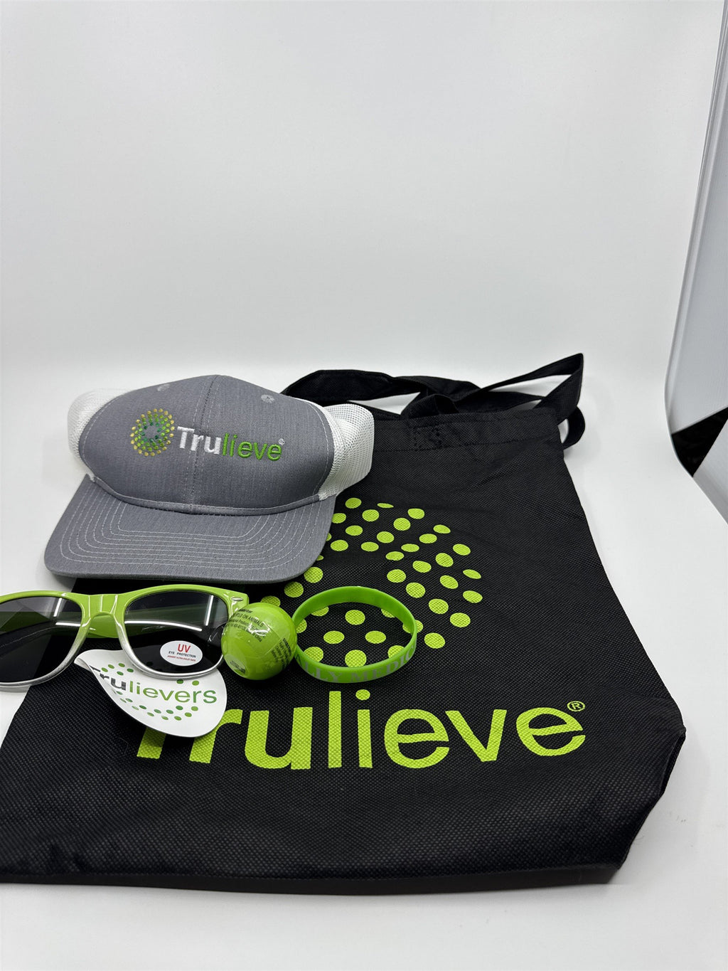 Trulieve Grey/Green Trucker Hat, Sunglasses, Sticker, Bracelet, Chapstick