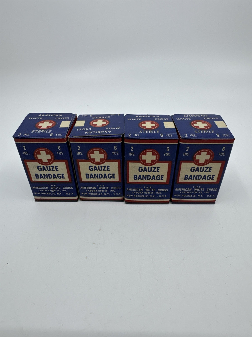 Set of Four Vintage American White Cross Labs Gauze Bandages 2 in 10 yds.