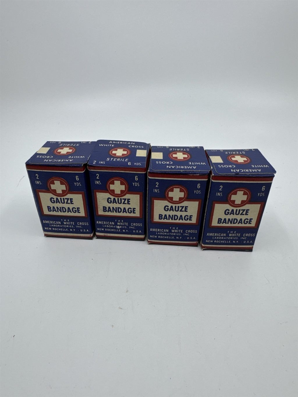 Set of Four Vintage American White Cross Labs Gauze Bandages 2 in 10 yds.