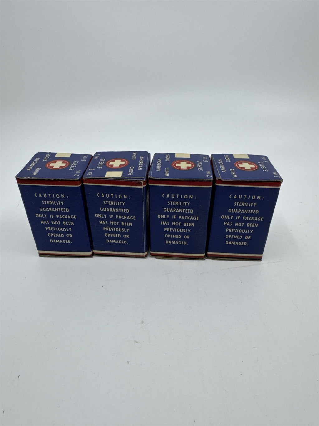 Set of Four Vintage American White Cross Labs Gauze Bandages 2 in 10 yds.