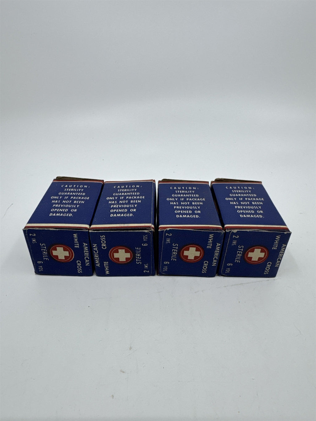 Set of Four Vintage American White Cross Labs Gauze Bandages 2 in 10 yds.