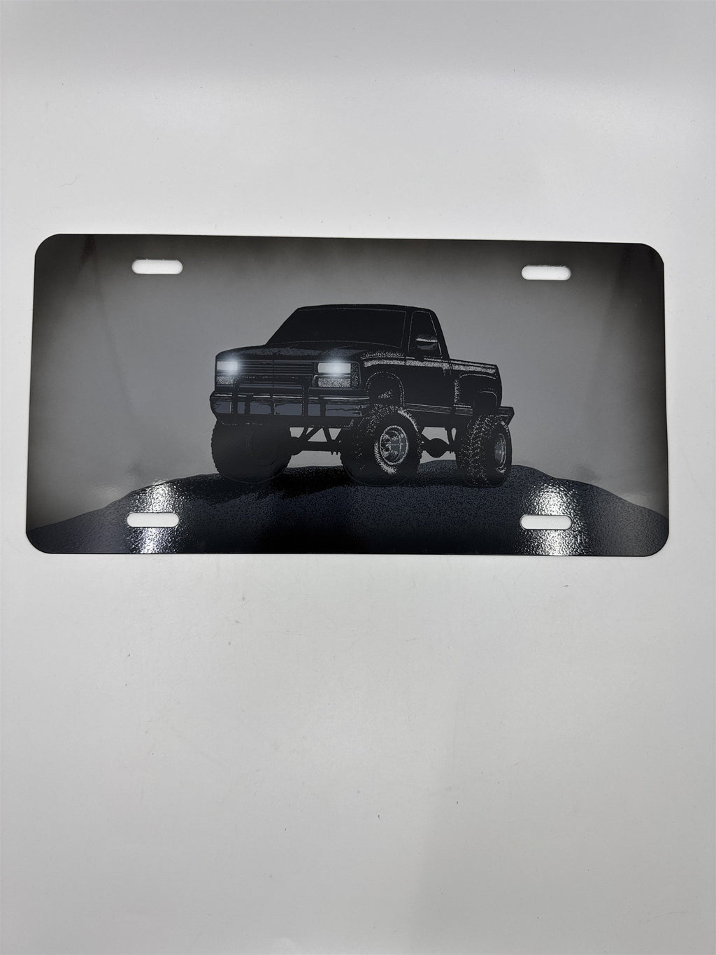 Vintage Grey Metal License Plate Sign with Black Lifted Truck for Truck Lovers
