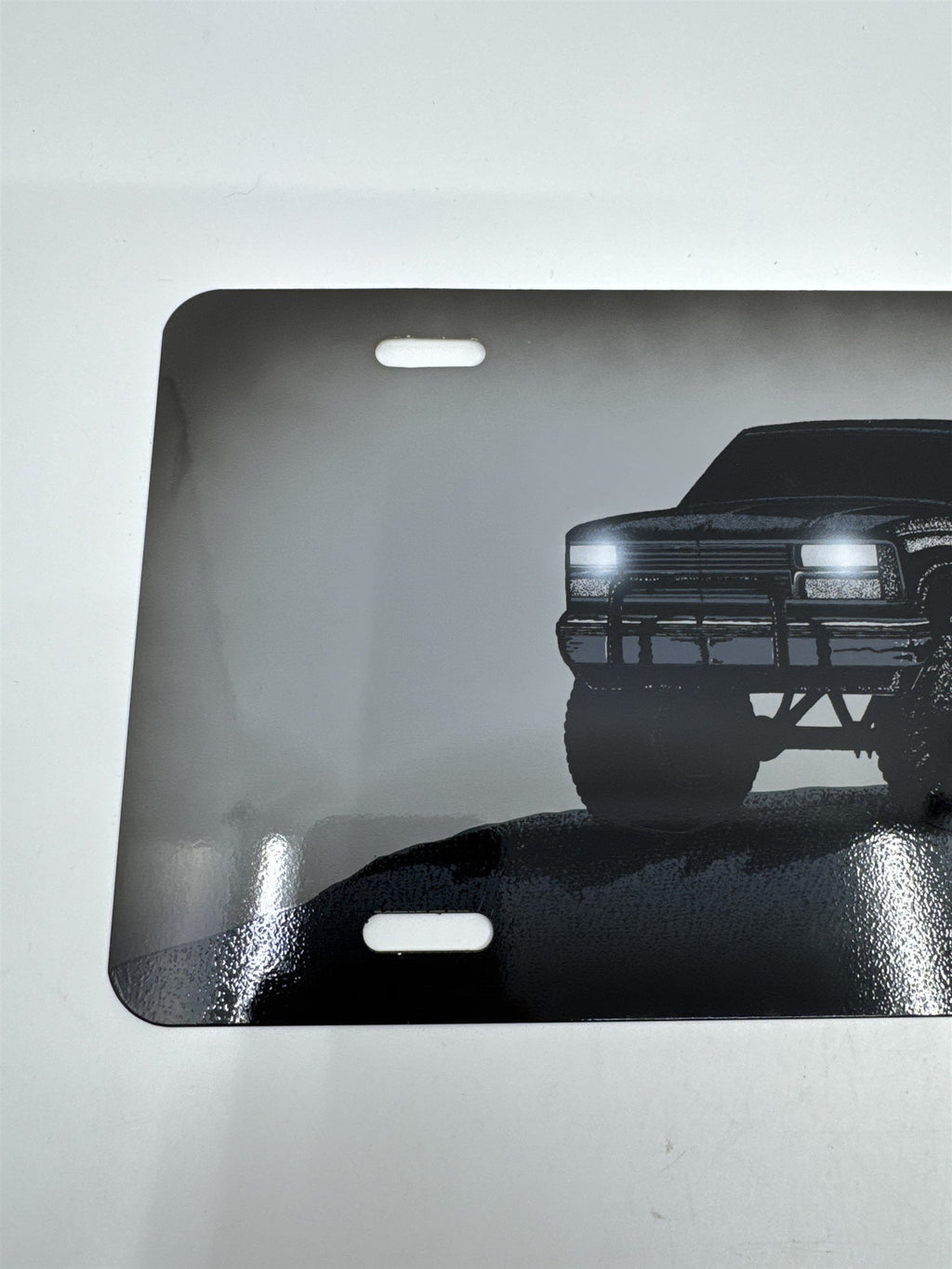 Vintage Grey Metal License Plate Sign with Black Lifted Truck for Truck Lovers