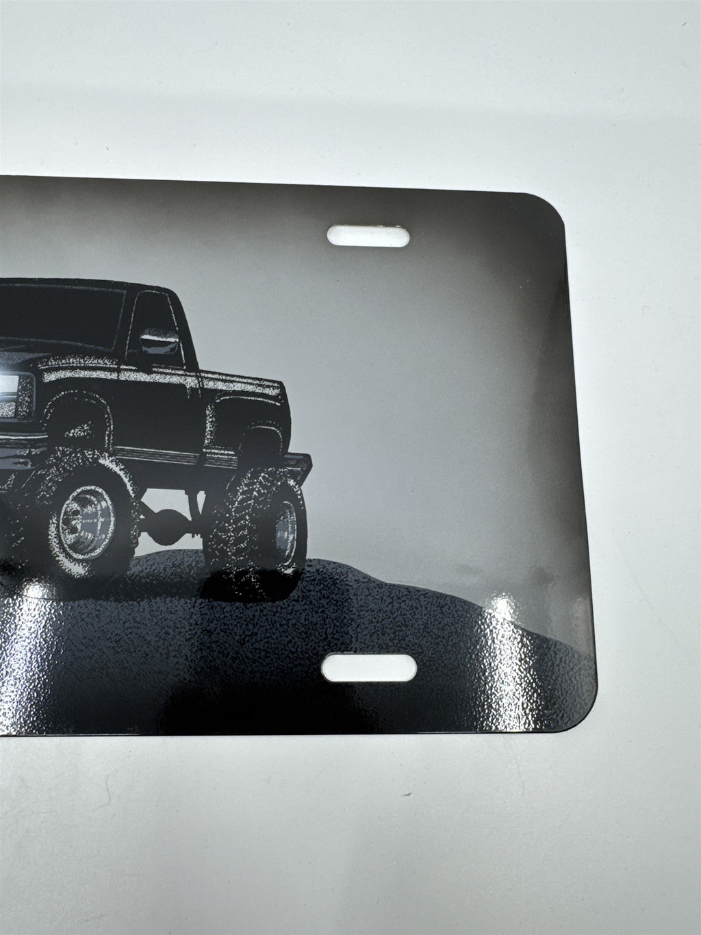Vintage Grey Metal License Plate Sign with Black Lifted Truck for Truck Lovers