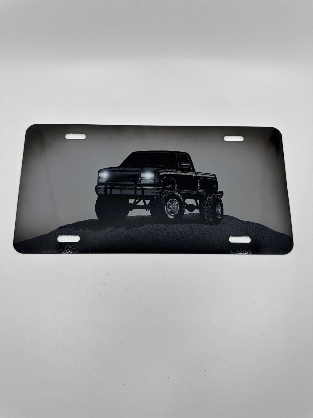 Vintage Grey Metal License Plate Sign with Black Lifted Truck for Truck Lovers