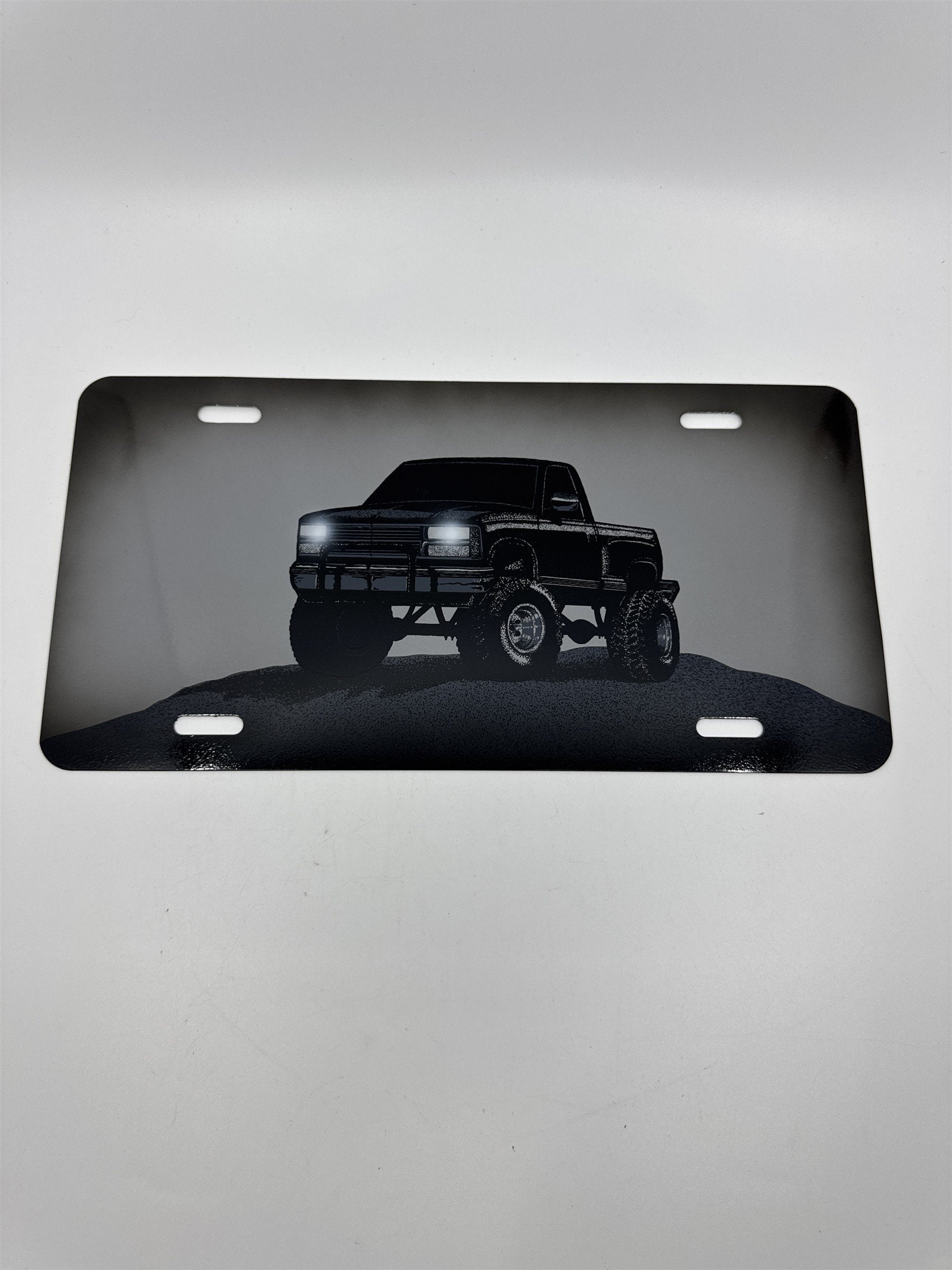 Vintage Grey Metal License Plate Sign with Black Lifted Truck for Truck Lovers