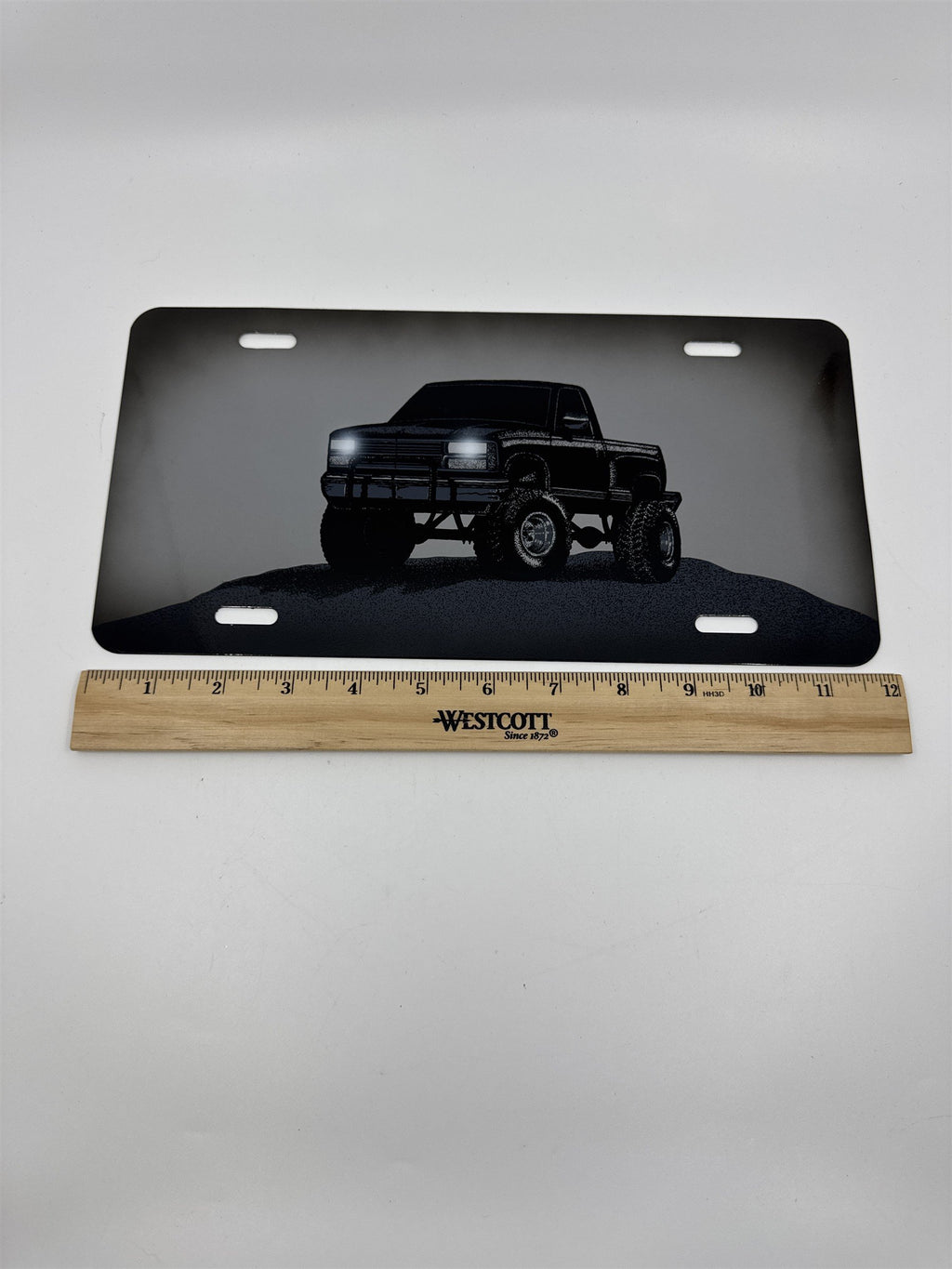 Vintage Grey Metal License Plate Sign with Black Lifted Truck for Truck Lovers