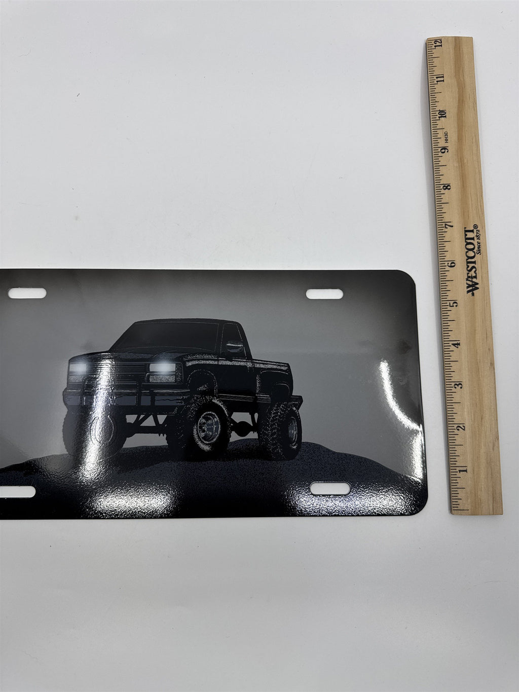 Vintage Grey Metal License Plate Sign with Black Lifted Truck for Truck Lovers