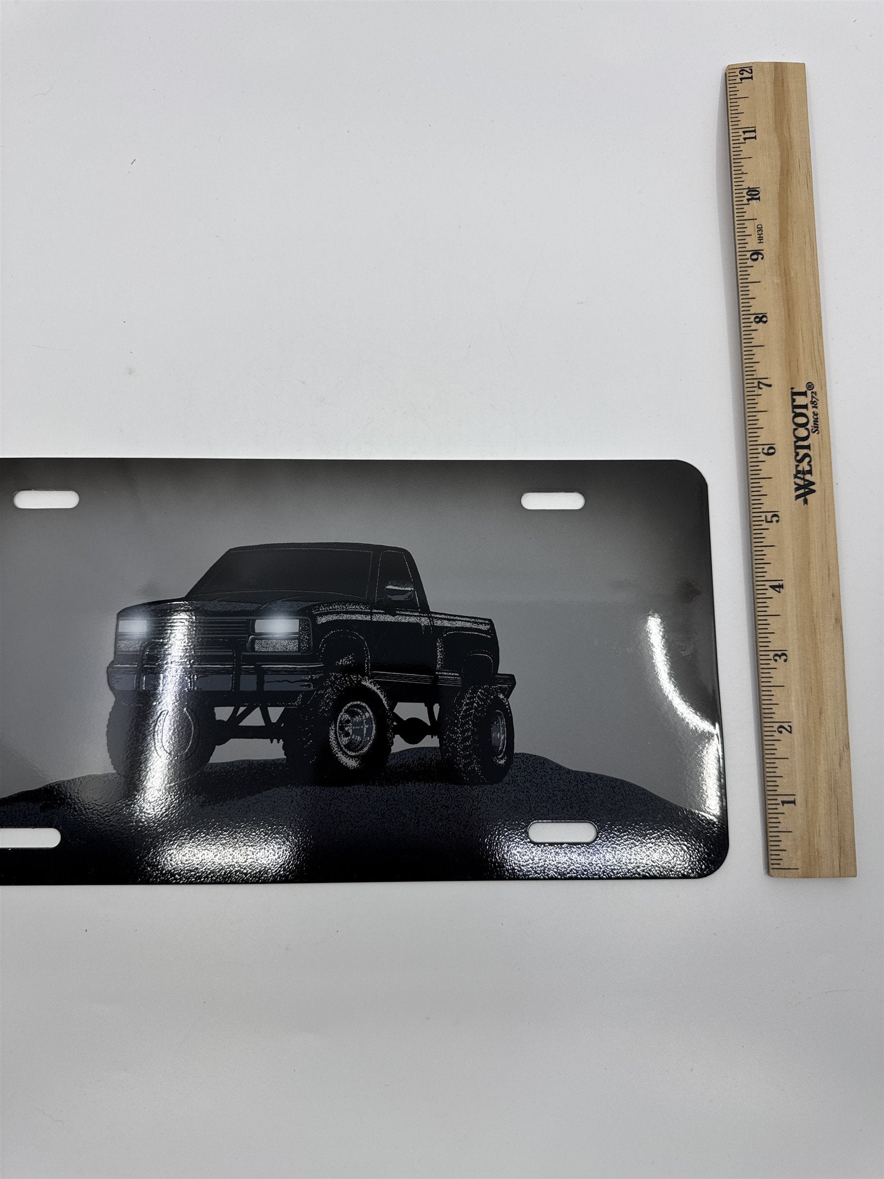 Vintage Grey Metal License Plate Sign with Black Lifted Truck for Truck Lovers