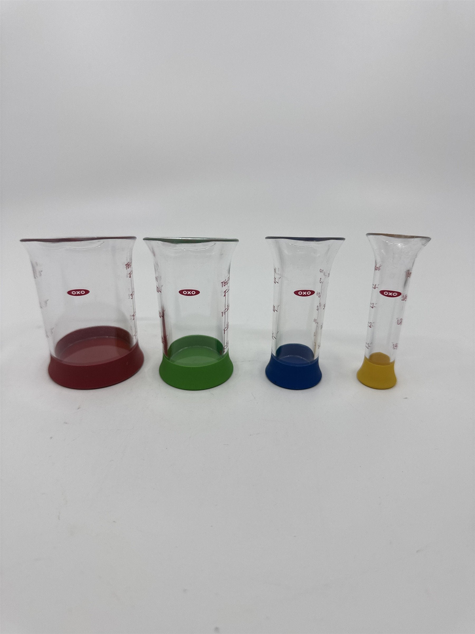 Set Of Four OXO Mini Measuring Beakers 4,2,1 Tablespoon and 1 Teaspoon