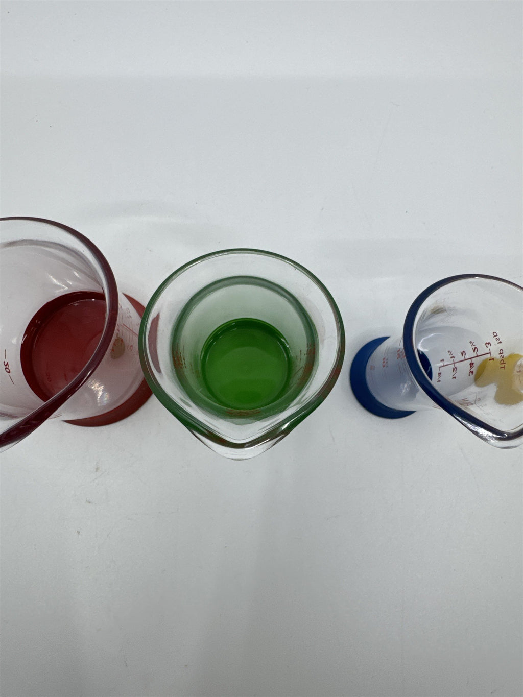 Set Of Four OXO Mini Measuring Beakers 4,2,1 Tablespoon and 1 Teaspoon