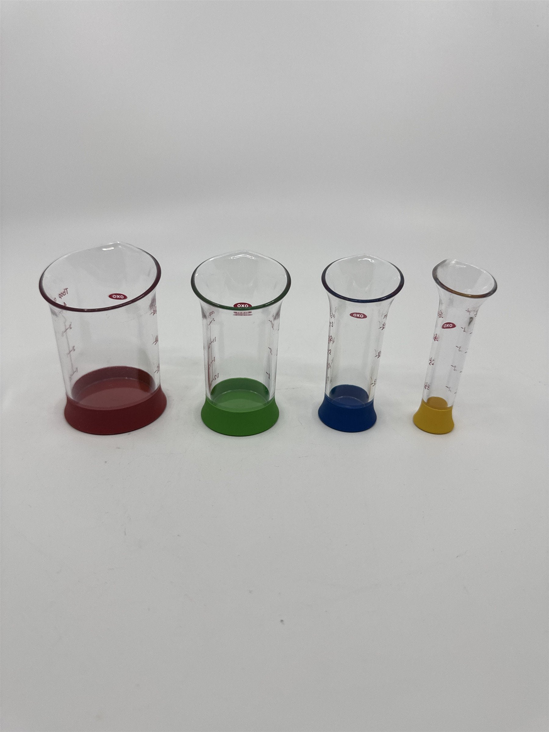 Set Of Four OXO Mini Measuring Beakers 4,2,1 Tablespoon and 1 Teaspoon