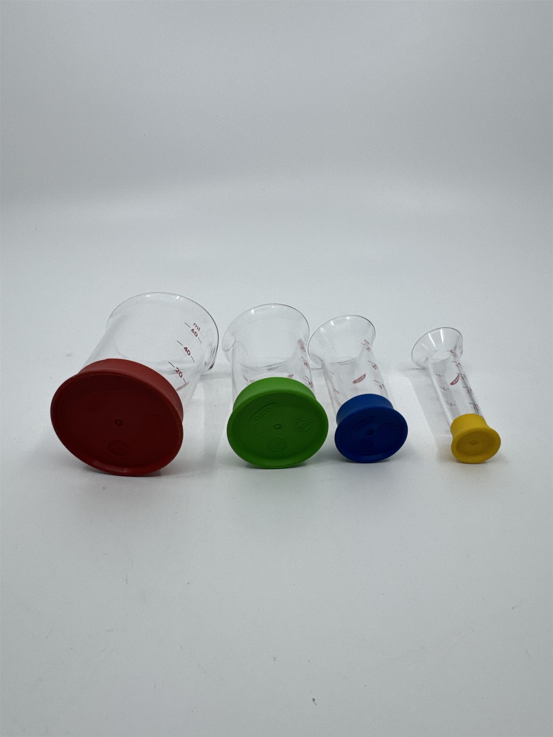 Set Of Four OXO Mini Measuring Beakers 4,2,1 Tablespoon and 1 Teaspoon