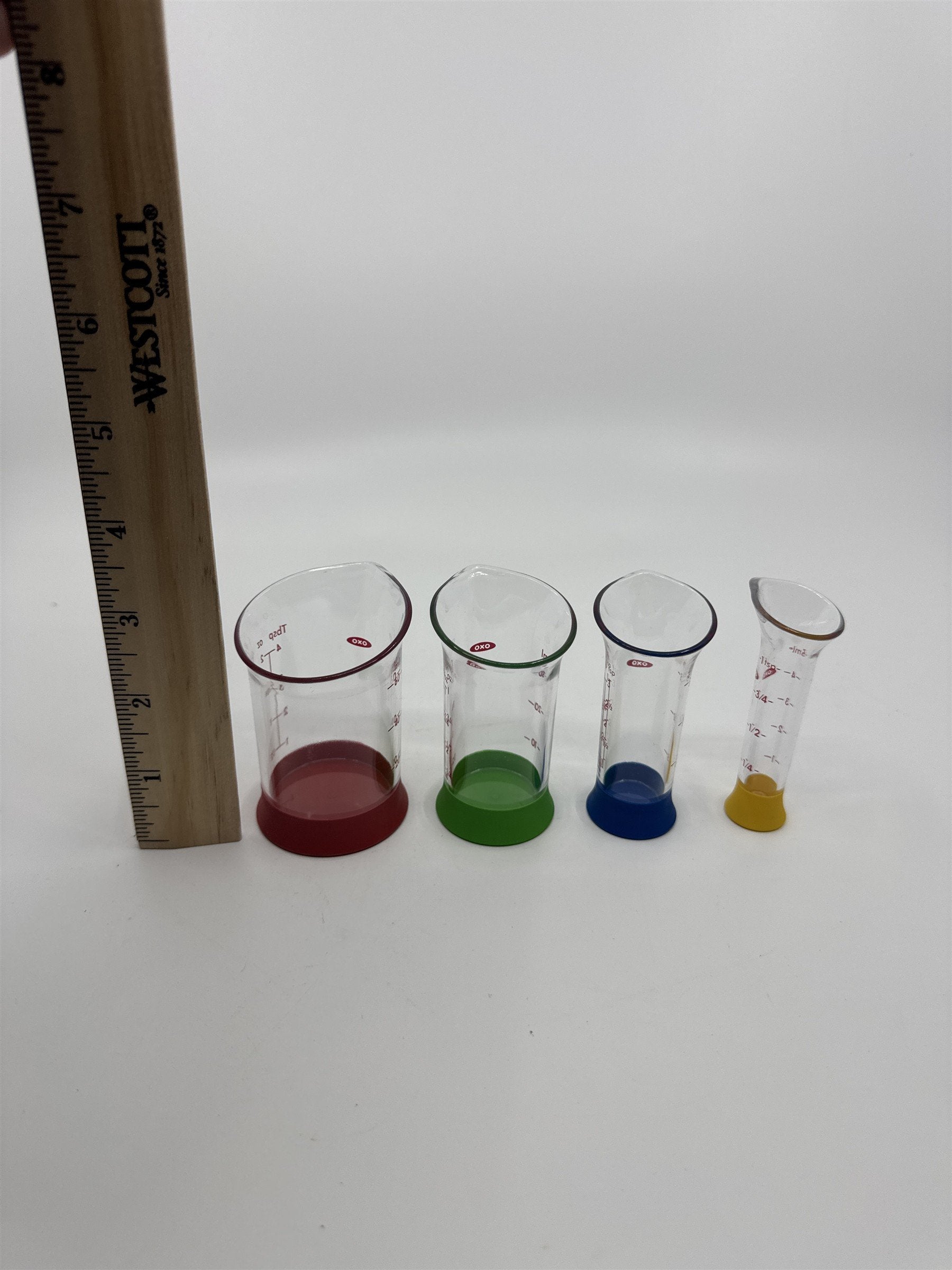 Set Of Four OXO Mini Measuring Beakers 4,2,1 Tablespoon and 1 Teaspoon