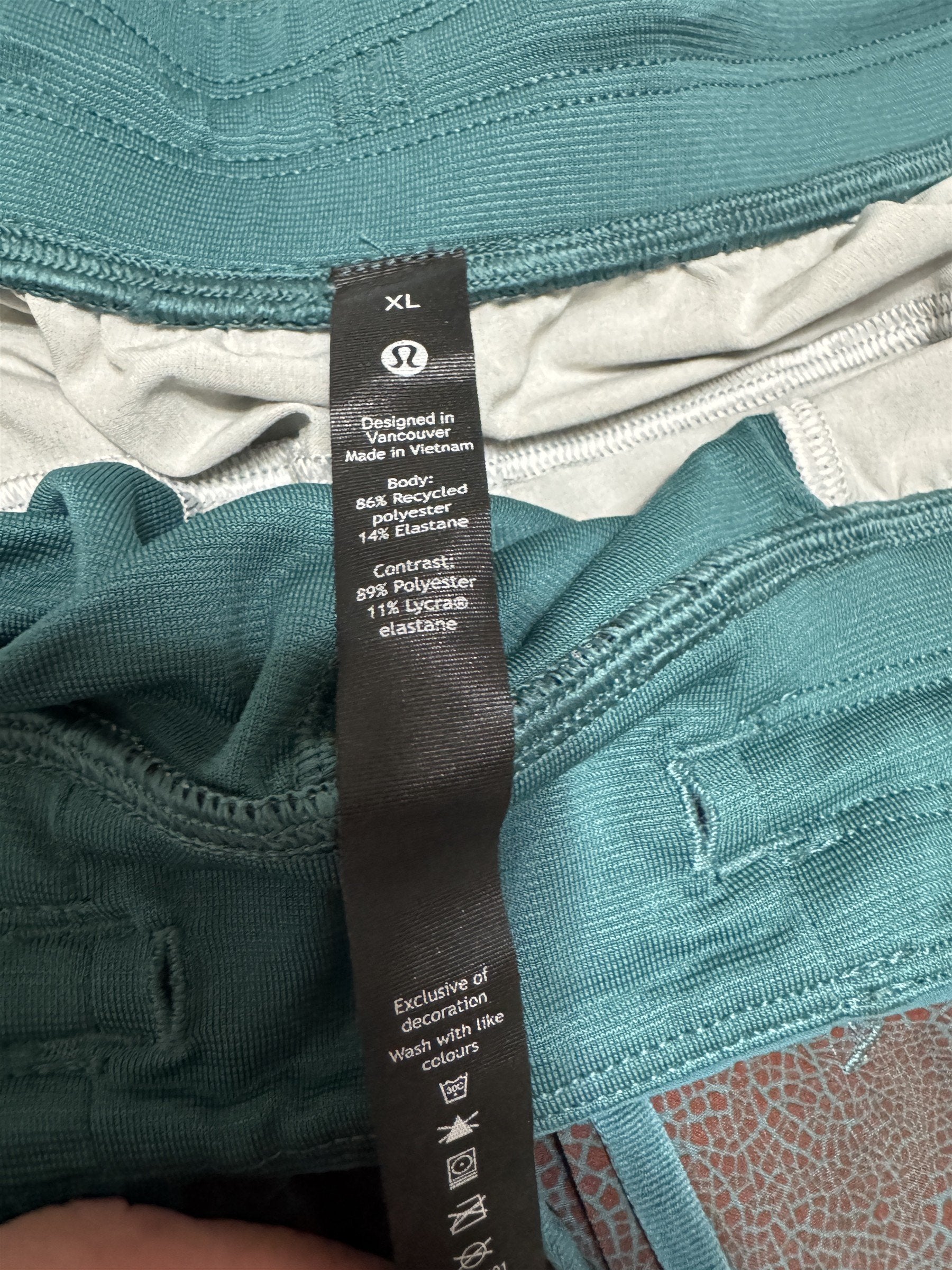 Lululemon Mens Linerless 9" Shorts Size XL Blue & Orange Animal Pattern Print