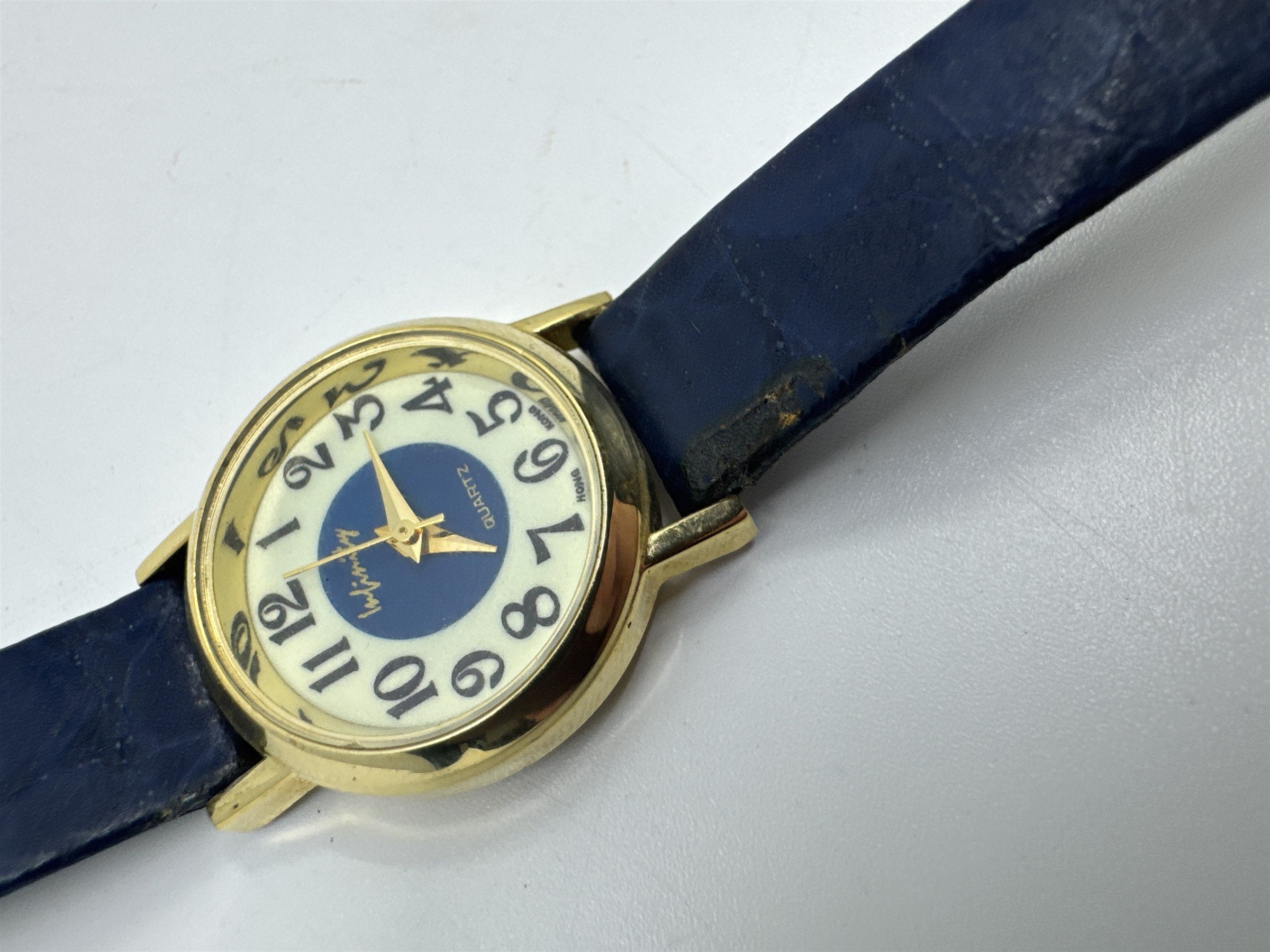 Vintage Blue Infinity Hong Kong Quartz Womens Wristwatch Gold Tone Leather Band