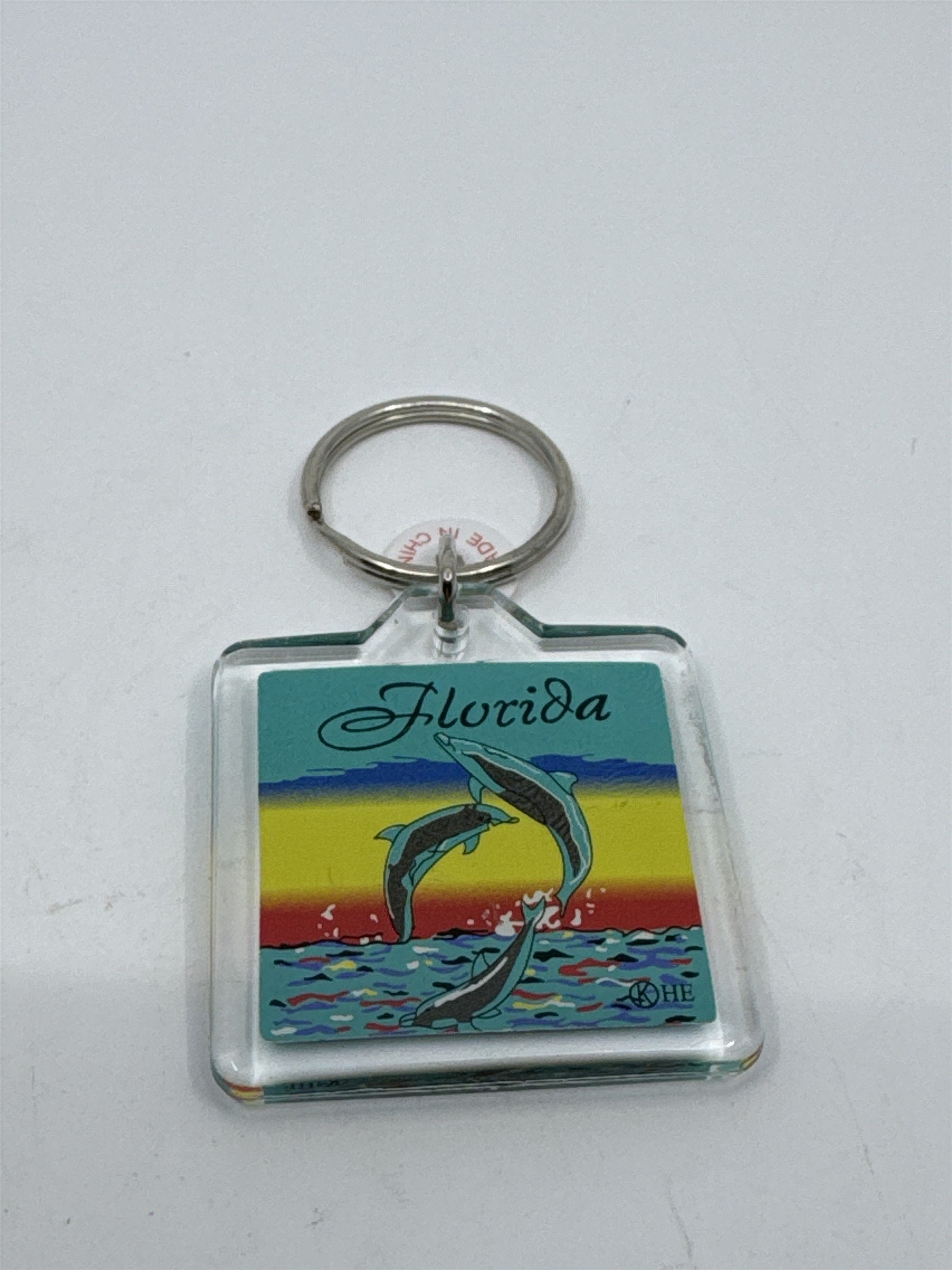 Souvenir Florida Keychain /w Three Dolphins Jumping Out of Ocean Together Scene