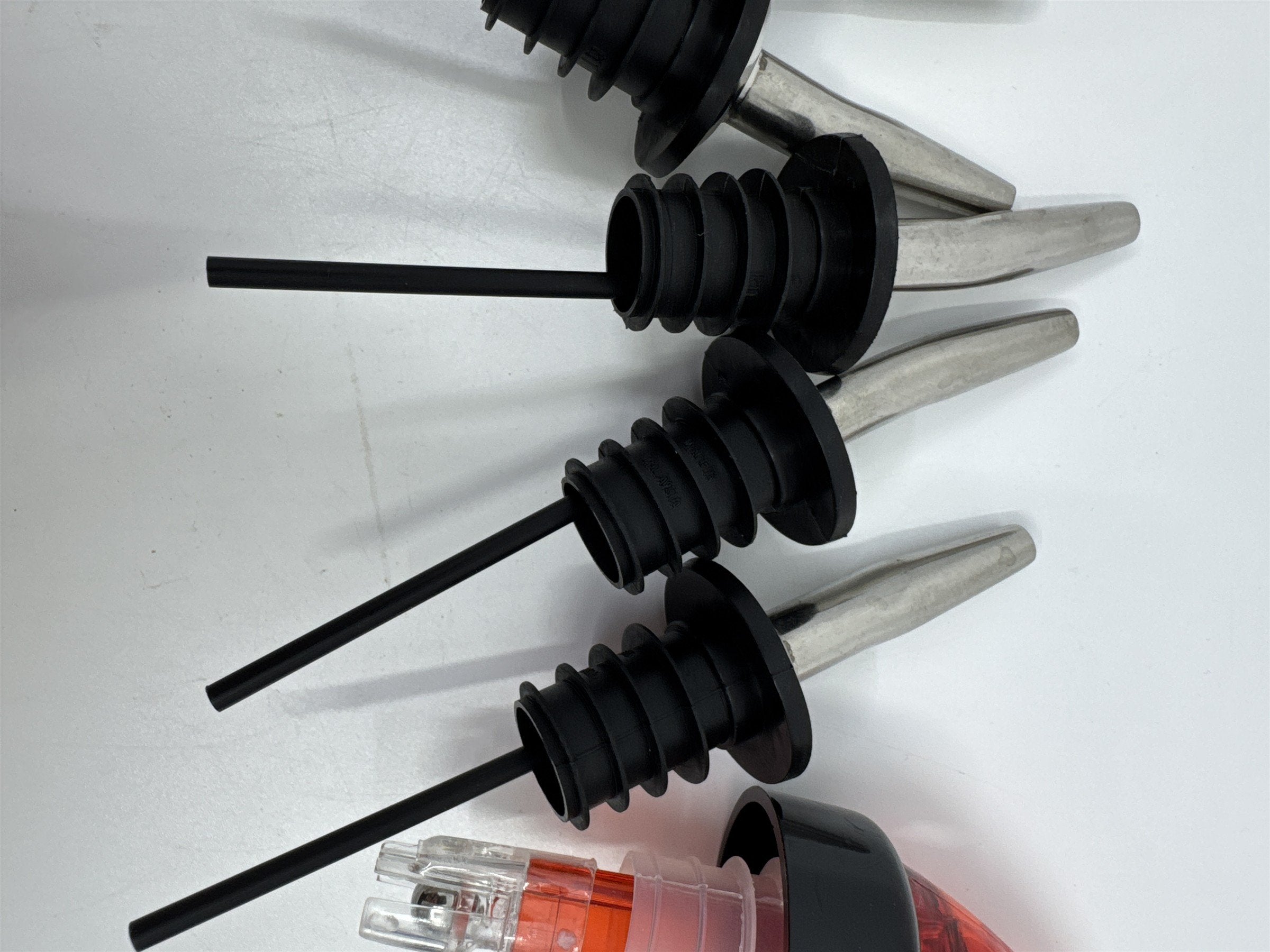 Set of 8 Liquor Pour Spouts/Adapters Stainless Steel with Silicone Grip