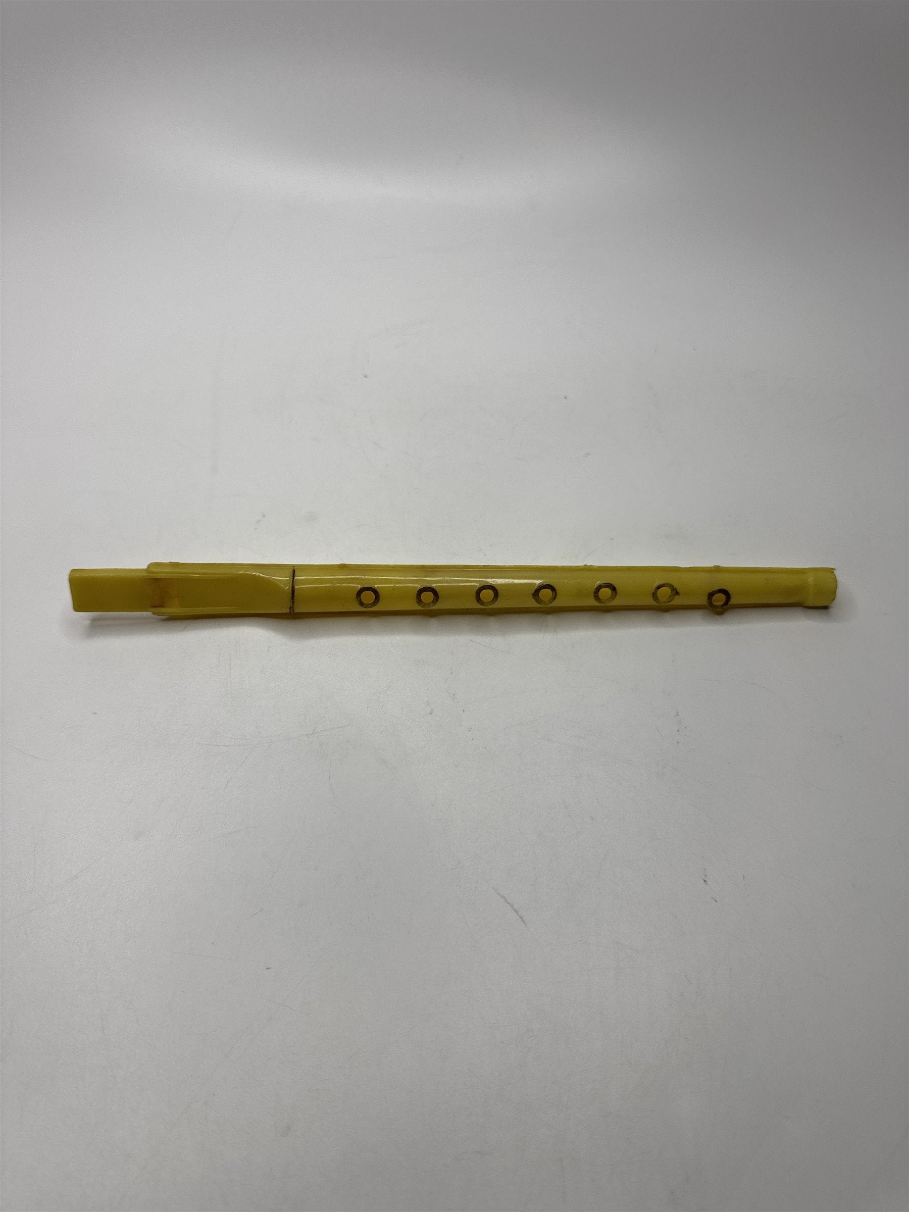Vintage 10" Yellow Plastic Flute Toy