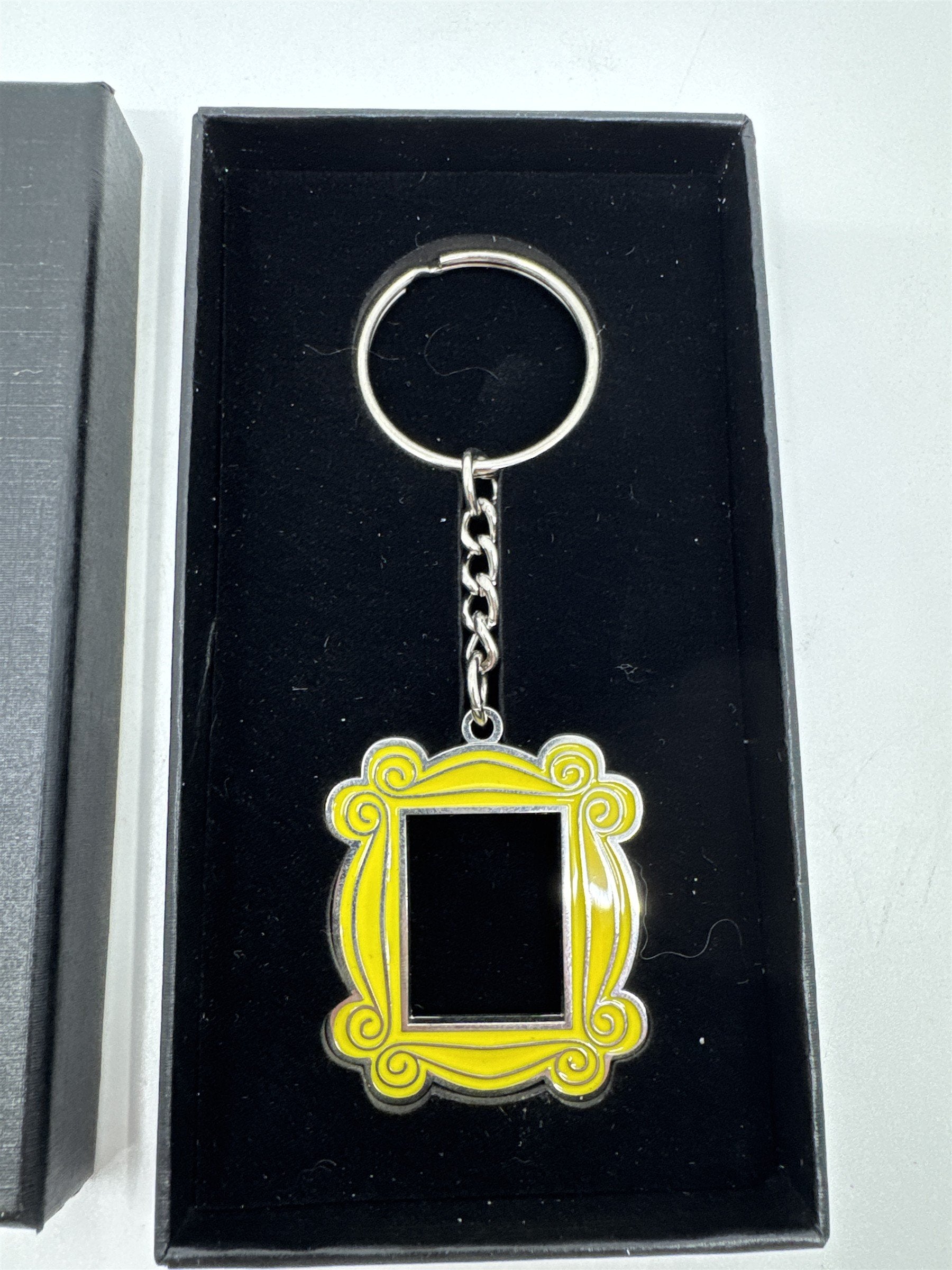 Friends The TV Series Yellow Peephole Frame From Monica's Door Keychain