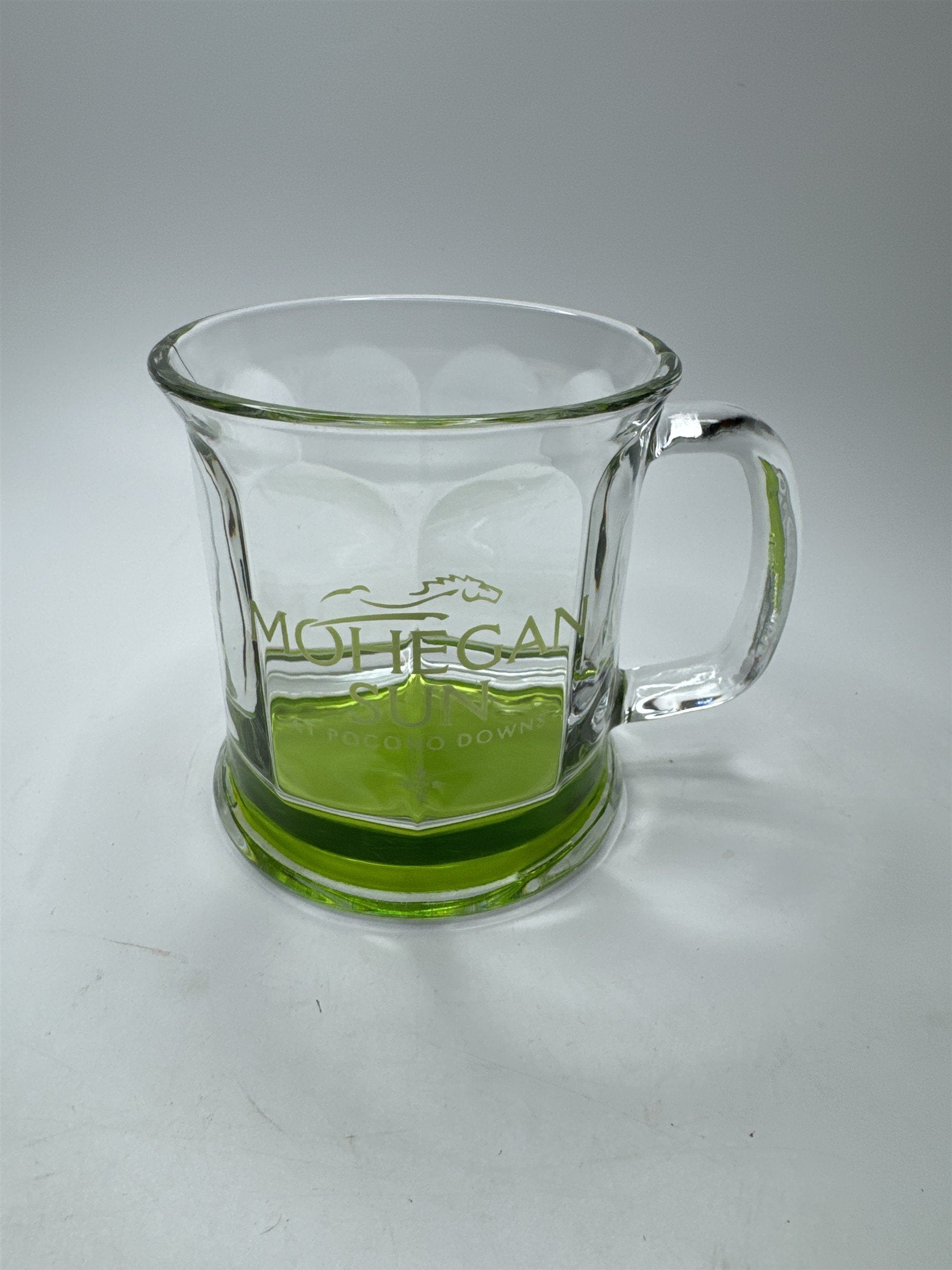 Mohegan Sun at Pocono Downs Coffee Mug Clear Glass /w Green Bottom Modern