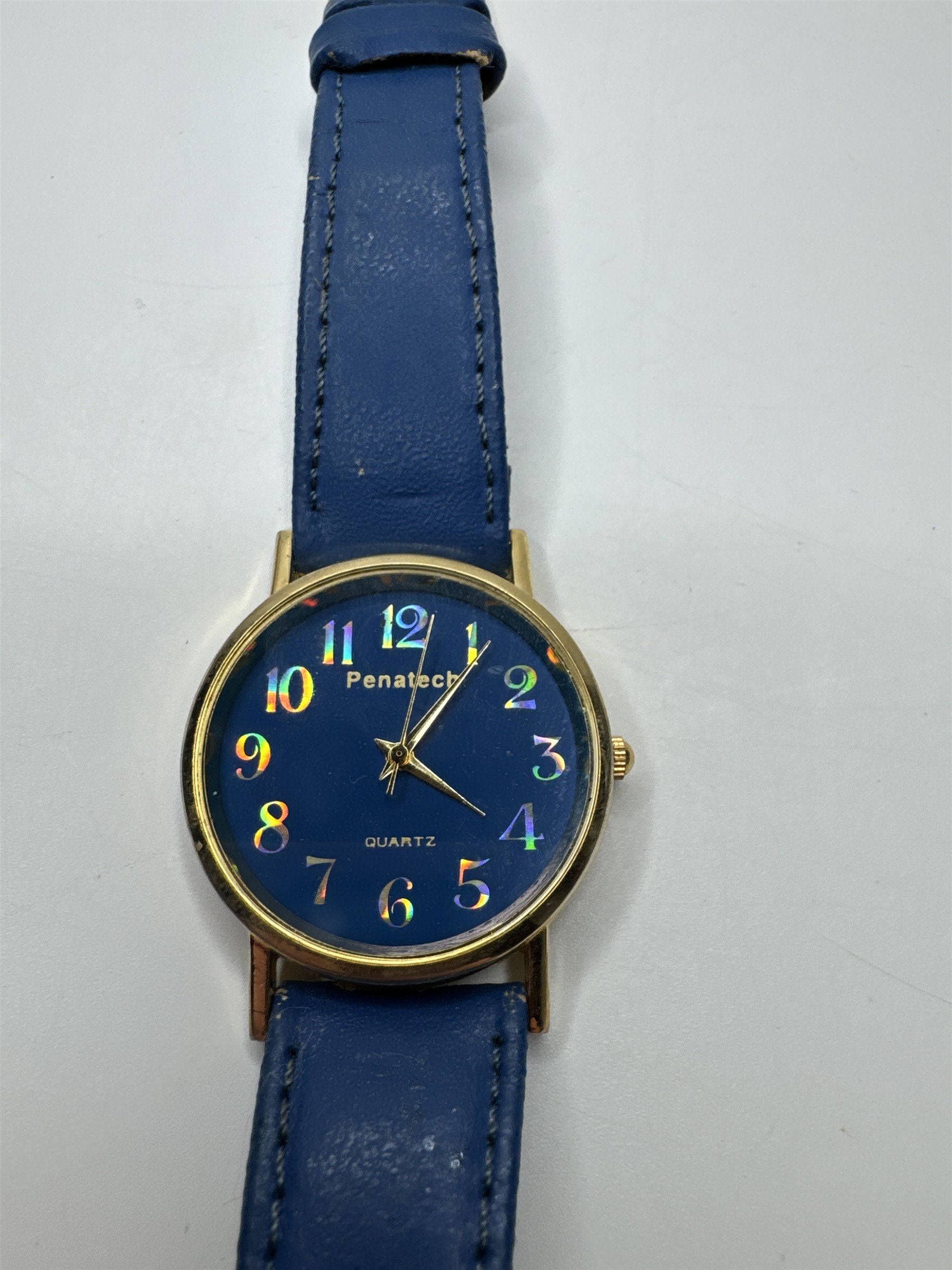 Womens Penatech Wristwratch /w Blue Wristband Gold Metallic Numbers