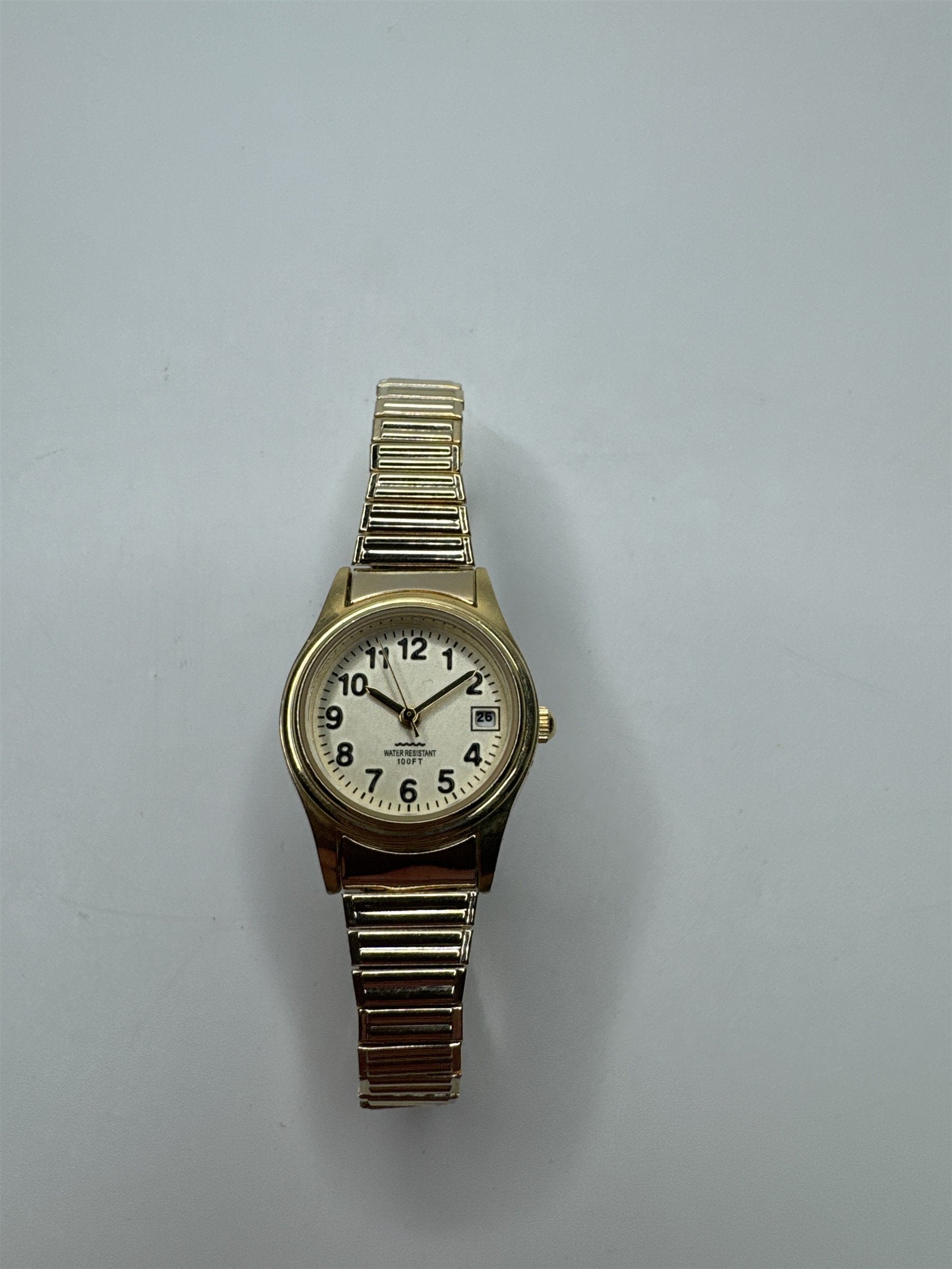 Womens M.Z. Berger Vintage Water Resistant Gold Toned Stretch Wristband Watch