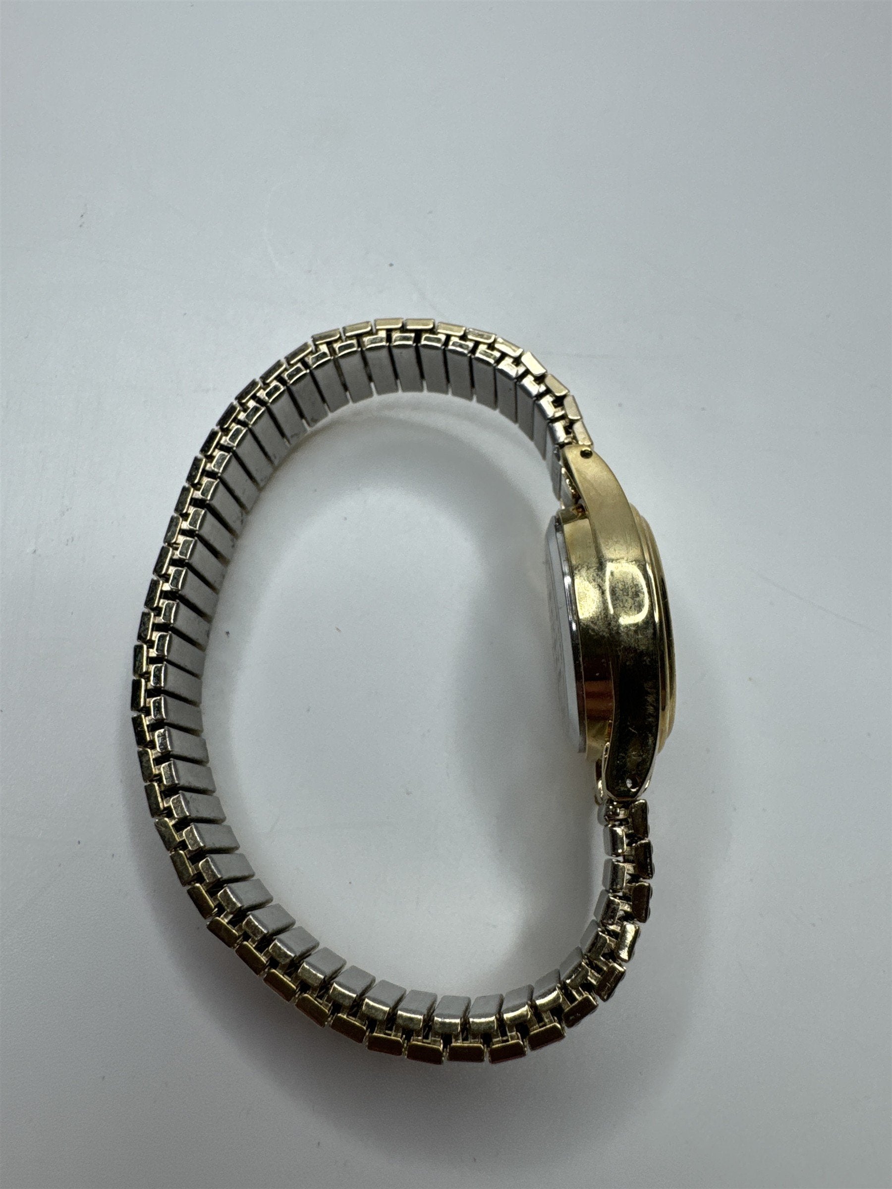 Womens M.Z. Berger Vintage Water Resistant Gold Toned Stretch Wristband Watch