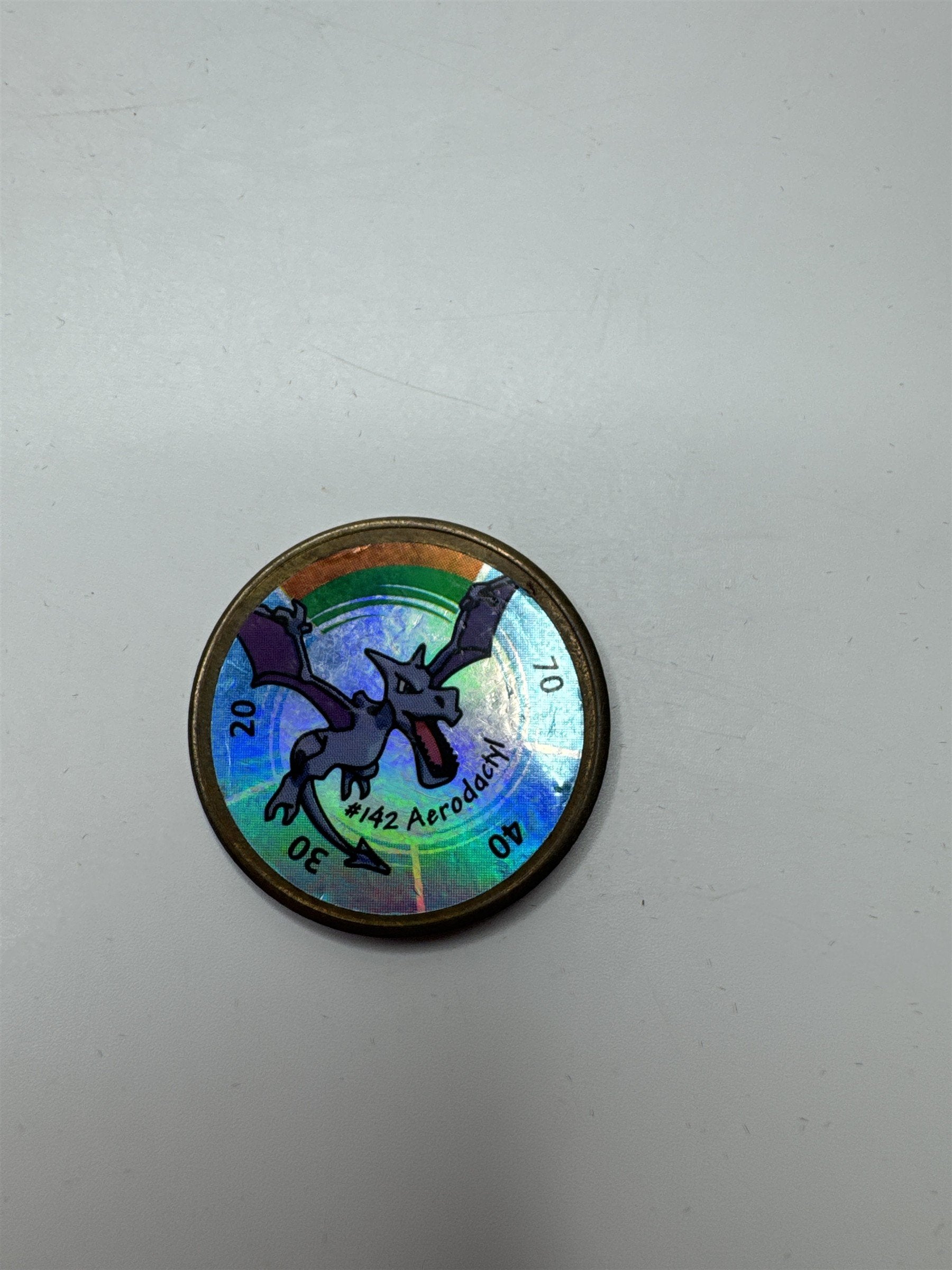 1999 Vintage Nintendo Hasbro Pokemon Battle Coin Gold Aerodactyl #142