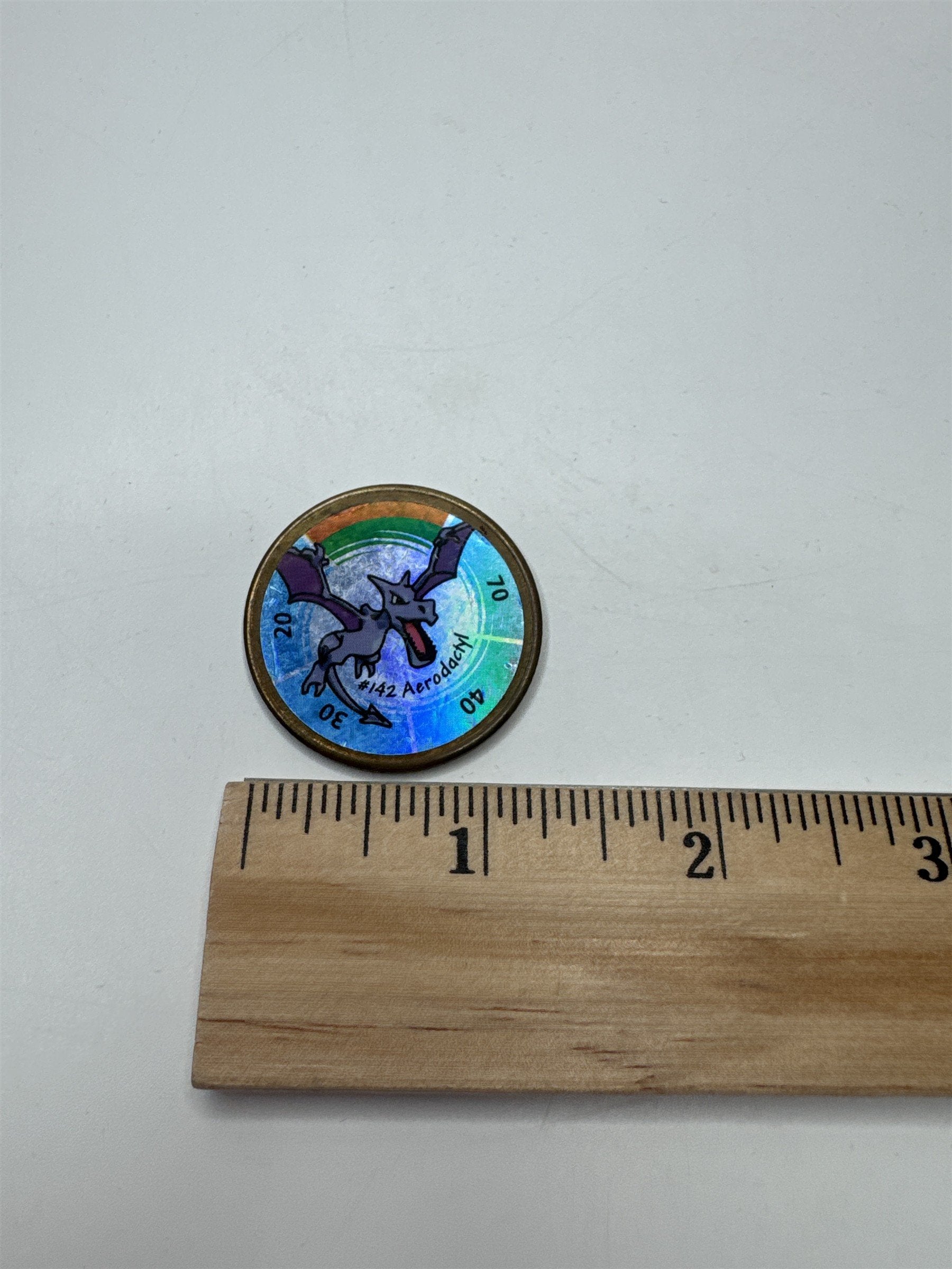 1999 Vintage Nintendo Hasbro Pokemon Battle Coin Gold Aerodactyl #142
