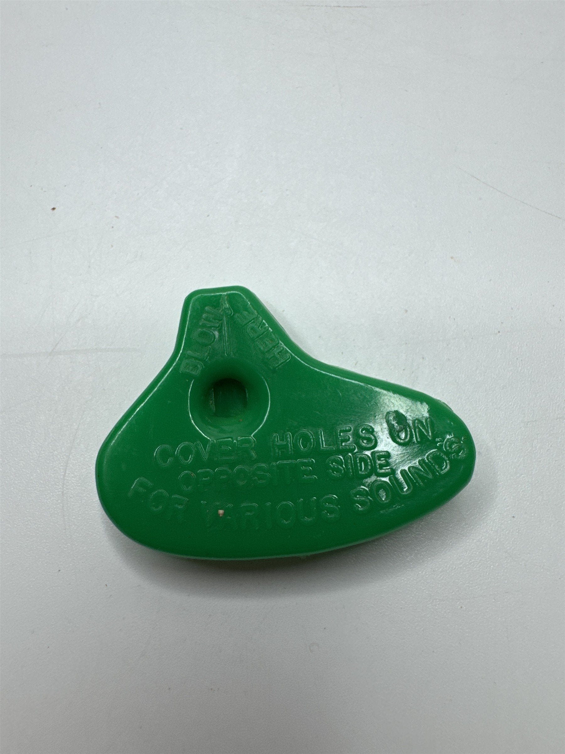 Vintage C.J. Co. Green Plastic Ocarina Blow Whistle Toy
