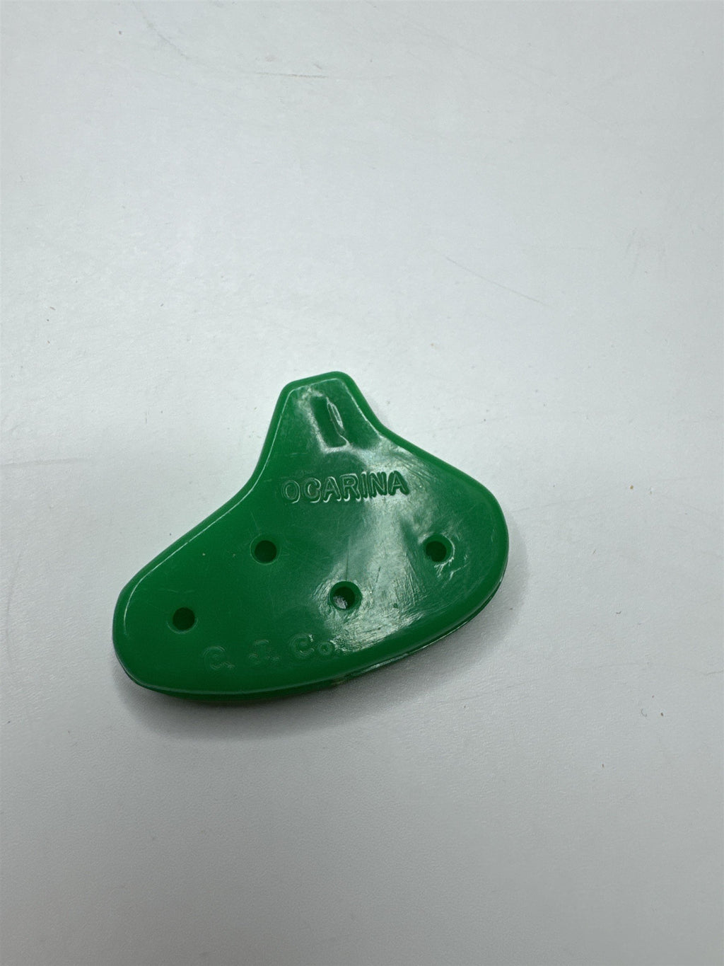 Vintage C.J. Co. Green Plastic Ocarina Blow Whistle Toy