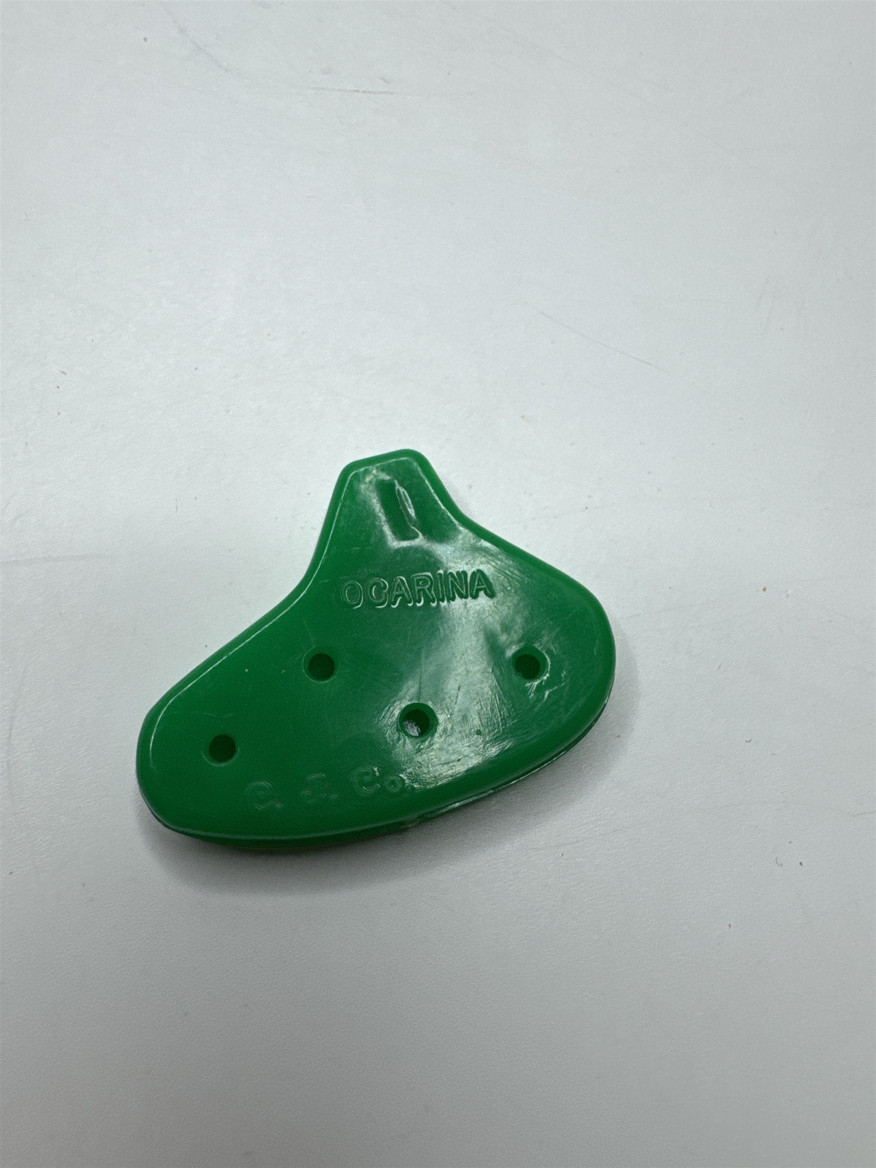 Vintage C.J. Co. Green Plastic Ocarina Blow Whistle Toy