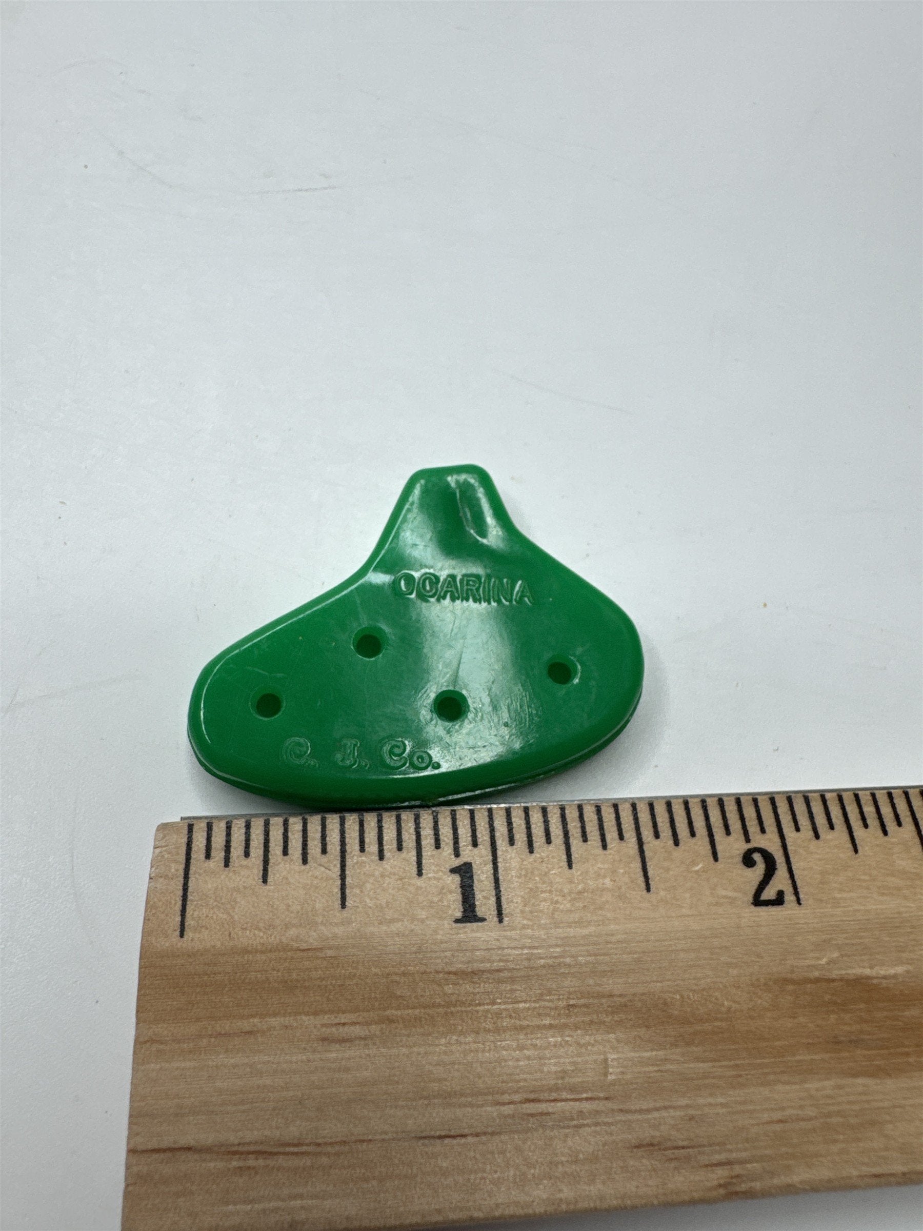 Vintage C.J. Co. Green Plastic Ocarina Blow Whistle Toy