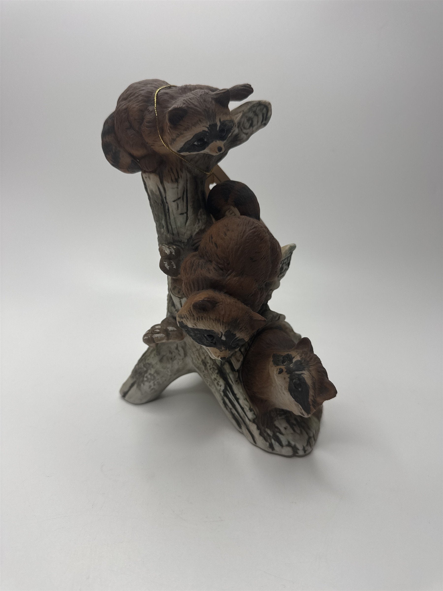 Vintage Masterpiece by Homco Home Interiors Ceramic Racoon Family on Log Tree