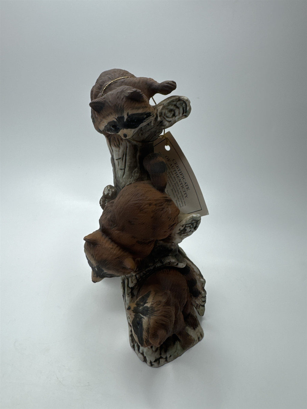 Vintage Masterpiece by Homco Home Interiors Ceramic Racoon Family on Log Tree