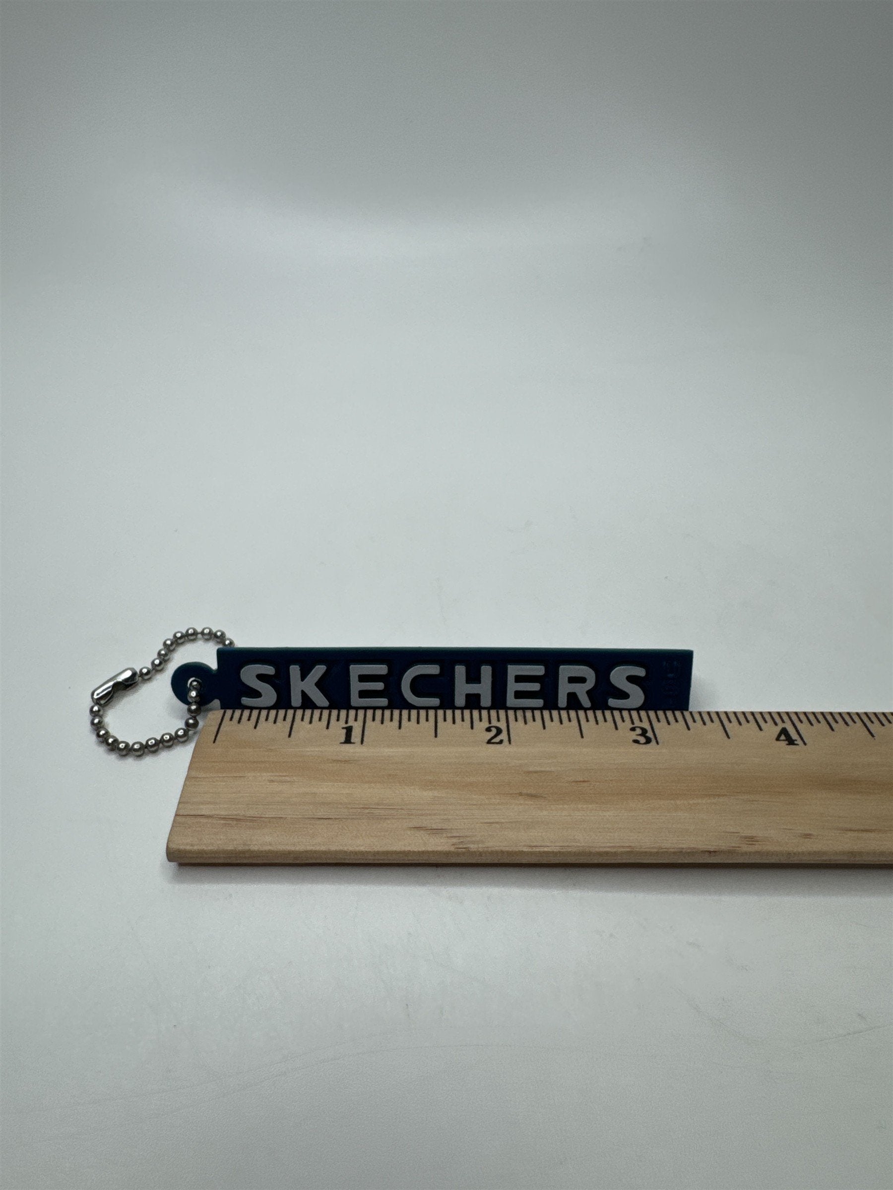 Vintage SKETCHERS Blue Plastic Resin Keychain