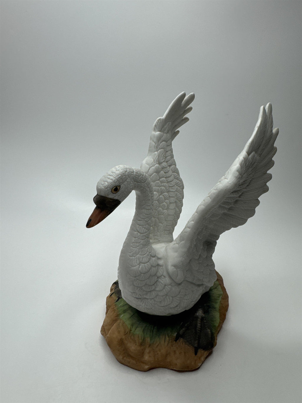 Vintage Porcelain Bisque Swan With Spread Wings Figurine Statue on Green Ground