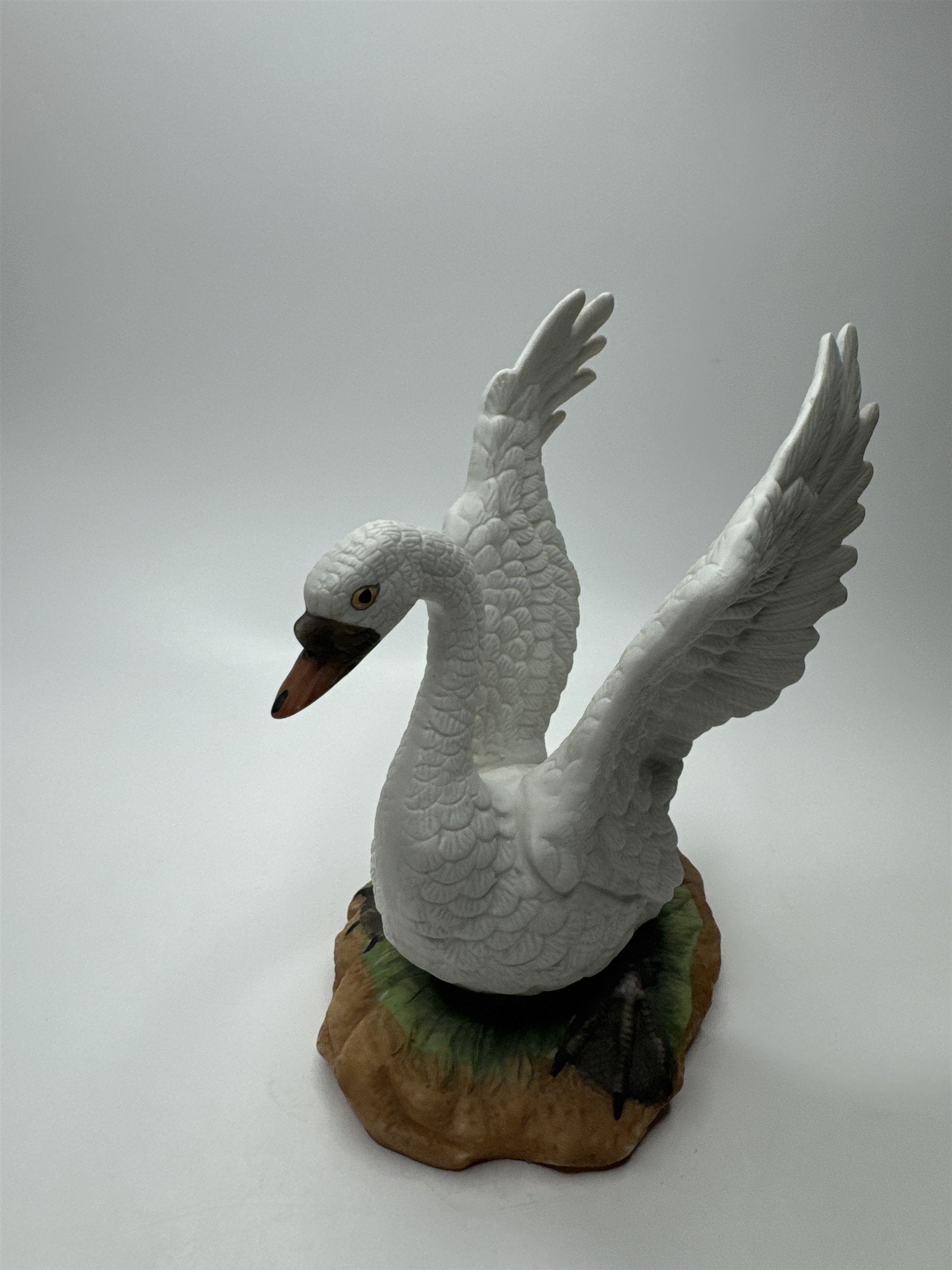 Vintage Porcelain Bisque Swan With Spread Wings Figurine Statue on Green Ground