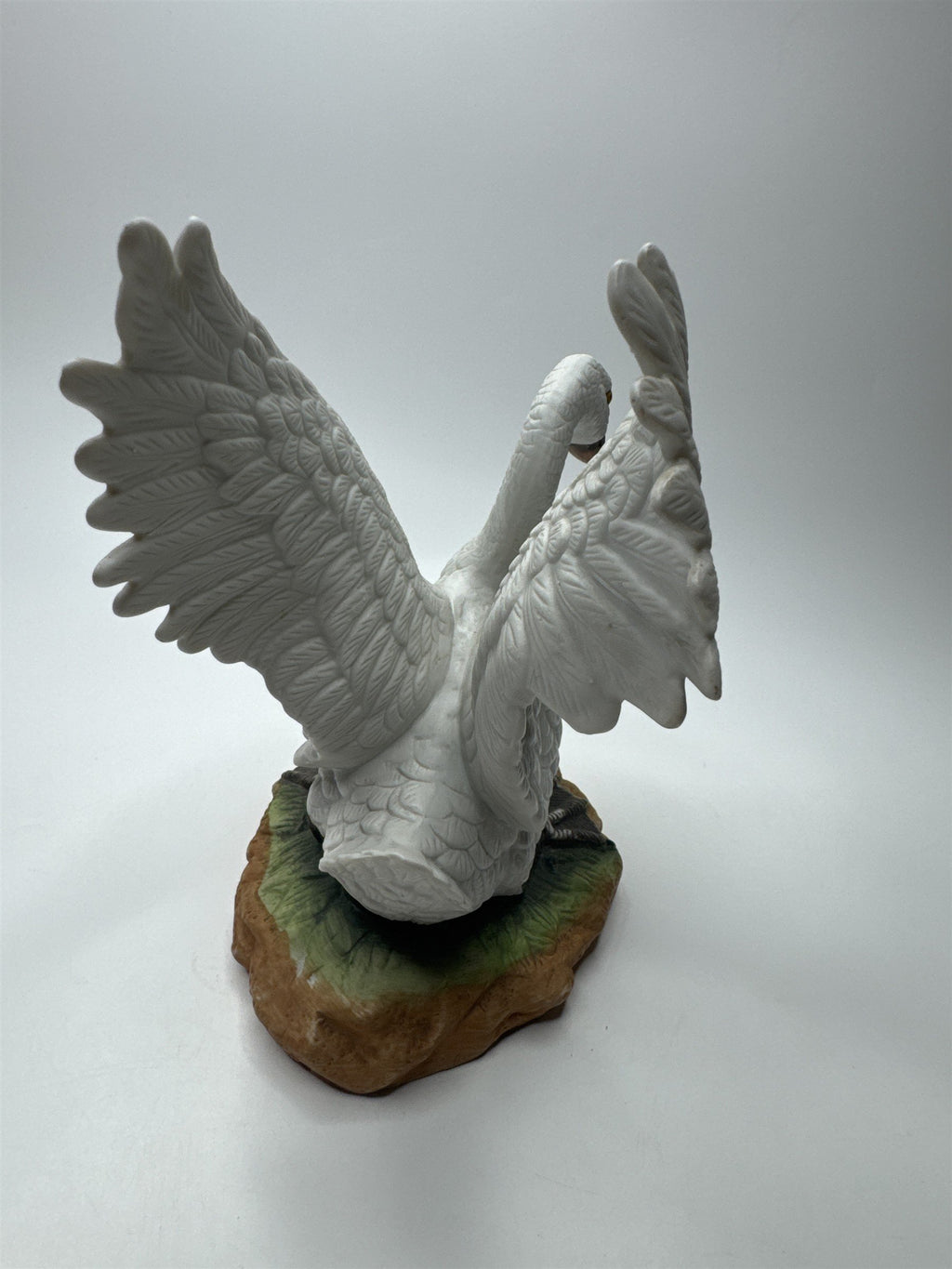 Vintage Porcelain Bisque Swan With Spread Wings Figurine Statue on Green Ground