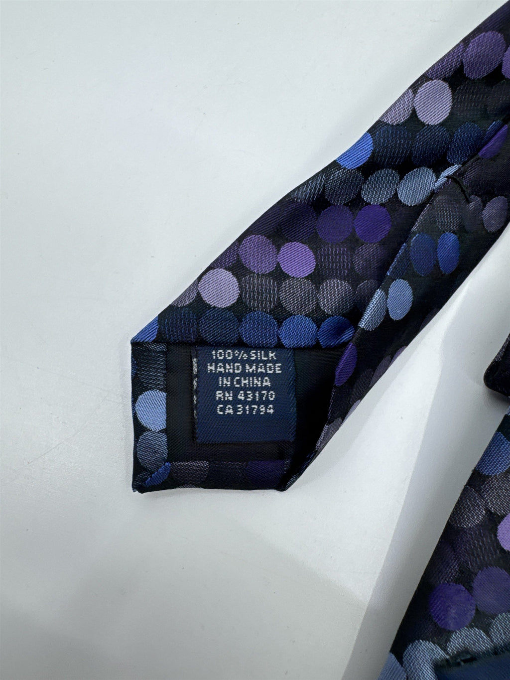 Blue, Black, And Purple Circle Pattern John Ashford Men's Neck Tie