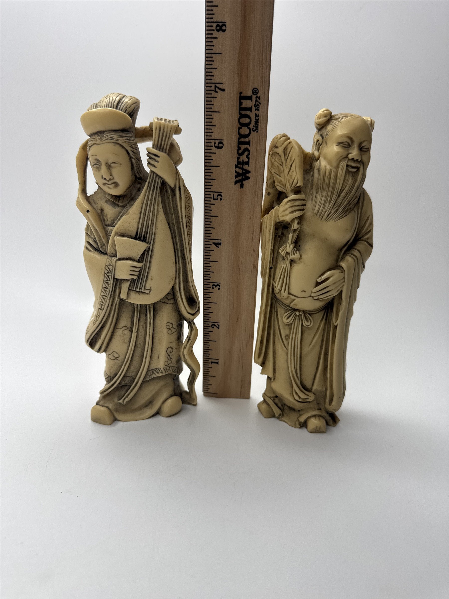 Vintage Resin Asian Statues of Woman Playing Instrument and Man Patting Belly