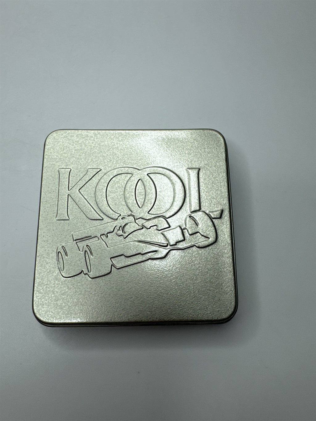 Vintage Kool Team Green Metal Swing Top Racecar Empty Cigarette Tin Container