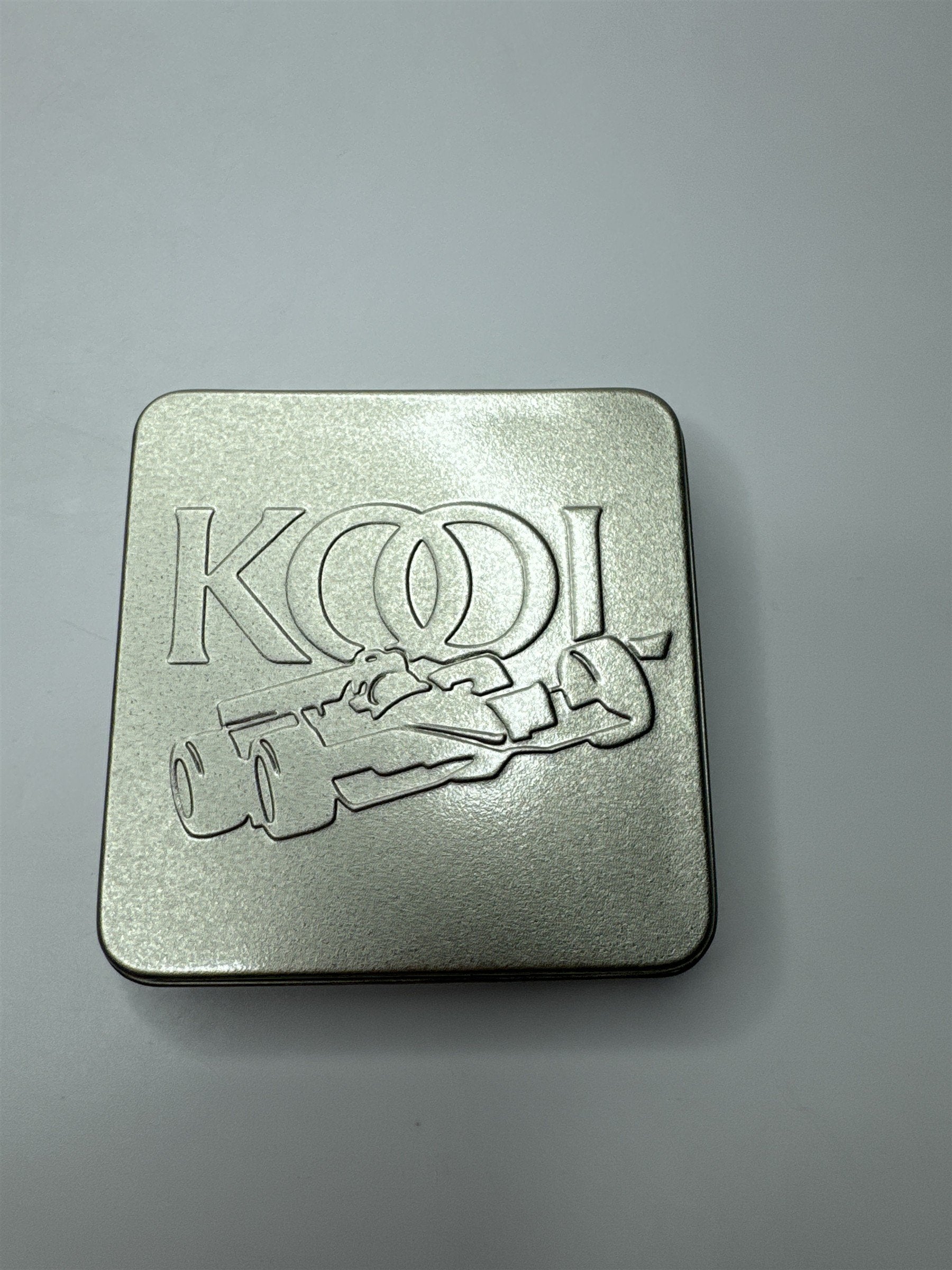 Vintage Kool Team Green Metal Swing Top Racecar Empty Cigarette Tin Container
