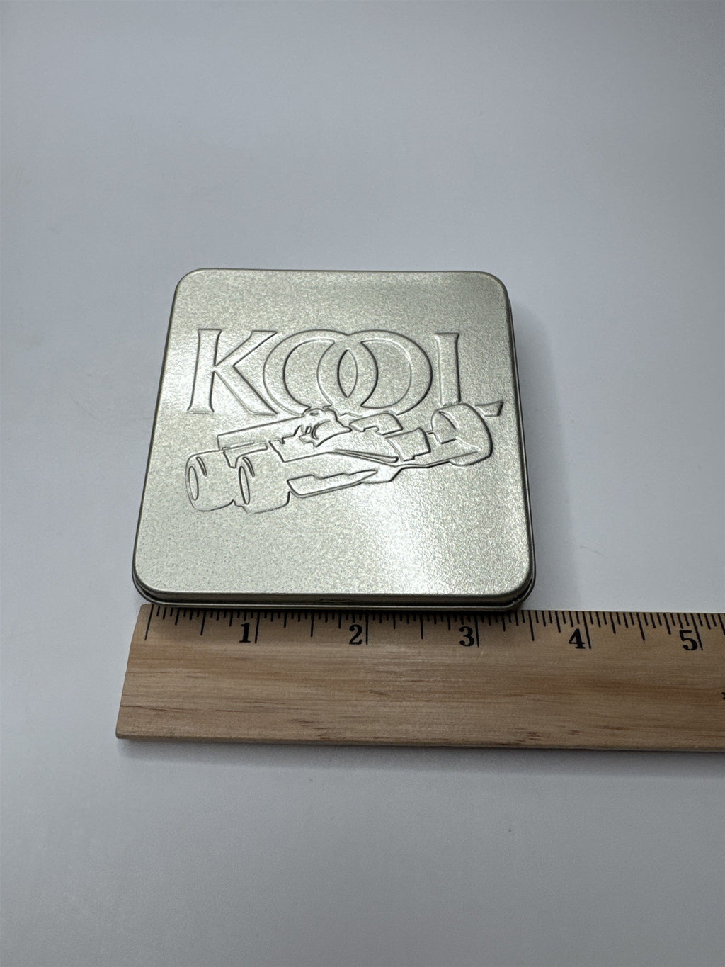 Vintage Kool Team Green Metal Swing Top Racecar Empty Cigarette Tin Container