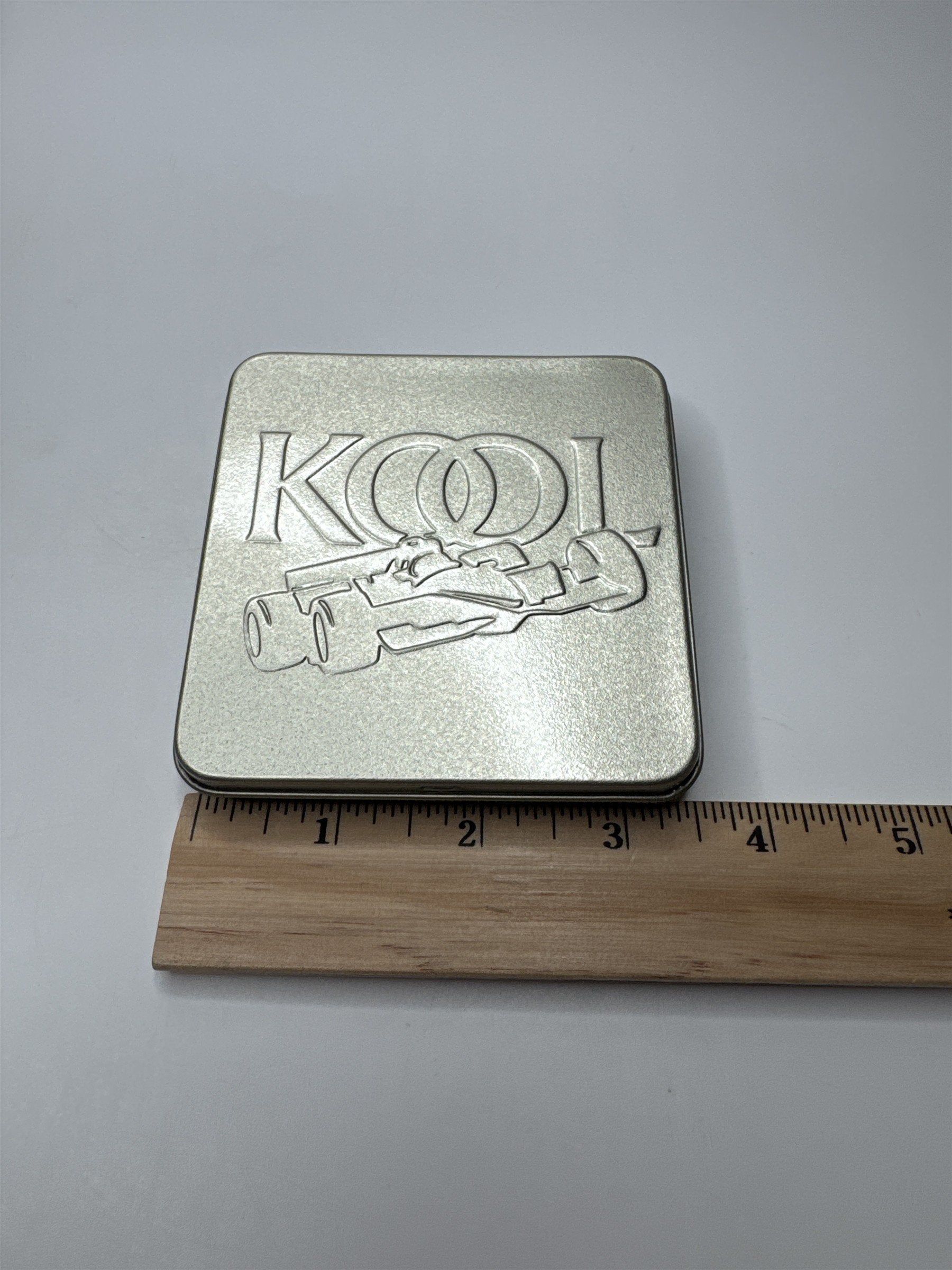 Vintage Kool Team Green Metal Swing Top Racecar Empty Cigarette Tin Container