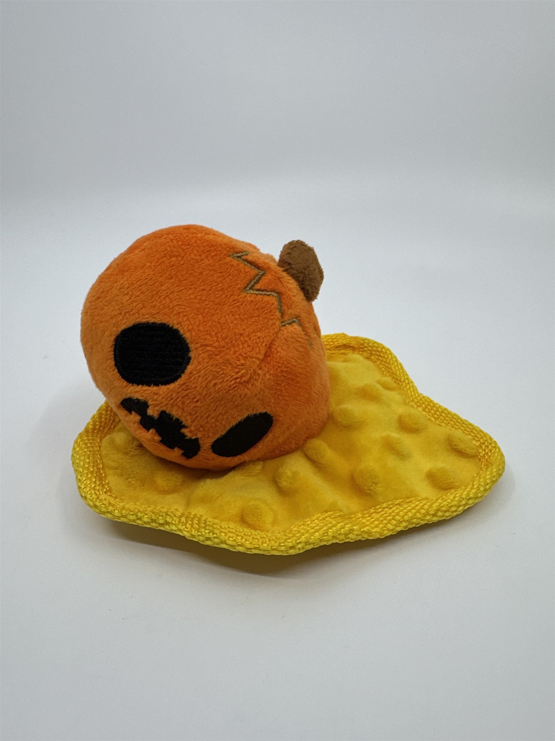 Smashed Pumpkin Halloween Bark Squeaker Dog Toy